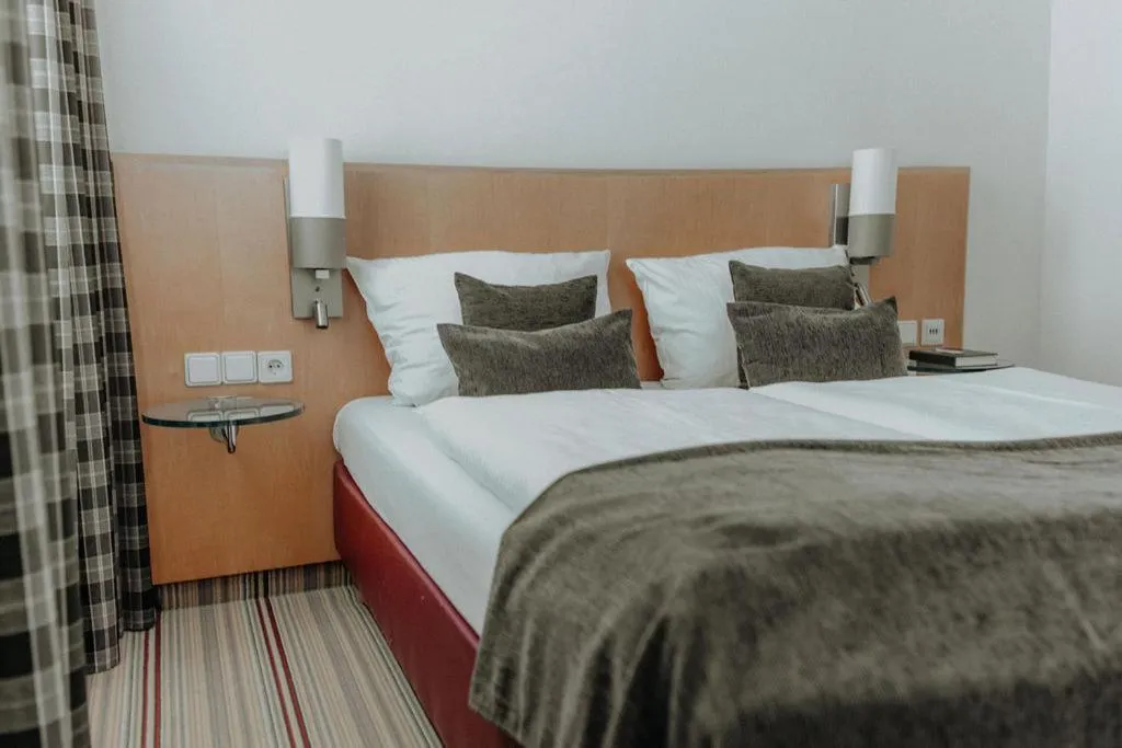 Bed in Hotel Ars Vivendi München