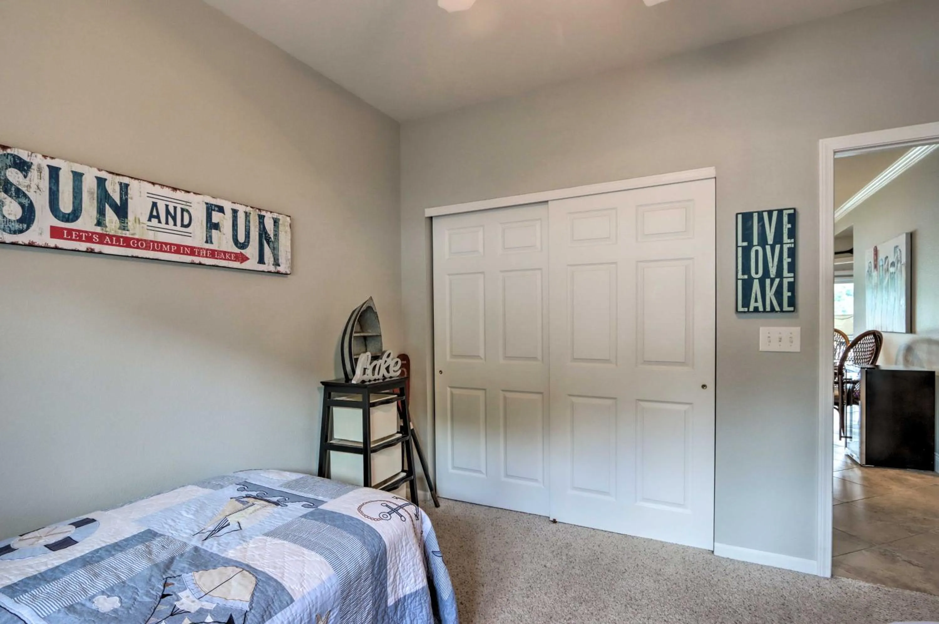 Bed in Lakefront Ozark Condo with Balcony and Seasonal Pool!