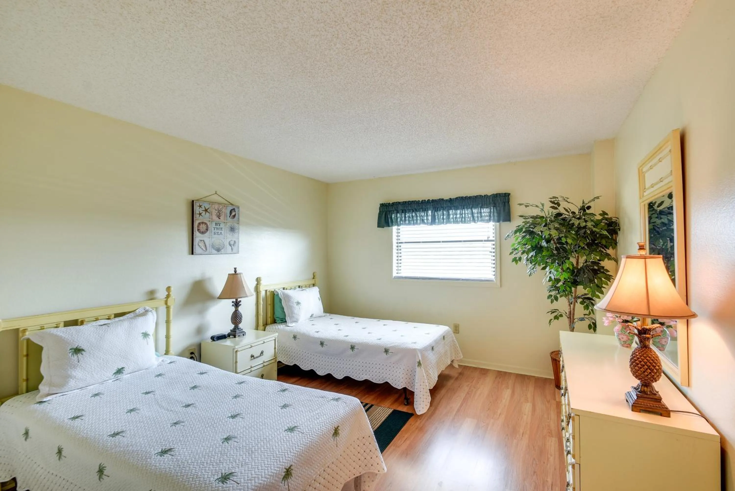 Bed in Walk to Madeira Beach Coastal Condo with Balcony