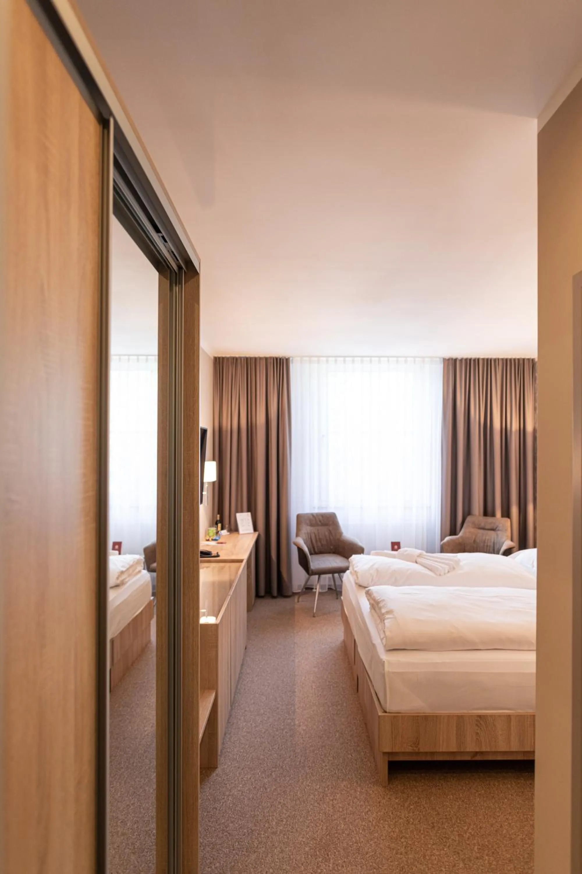 Photo of the whole room, Bed in Schloss Breitenfeld Hotel & Tagung