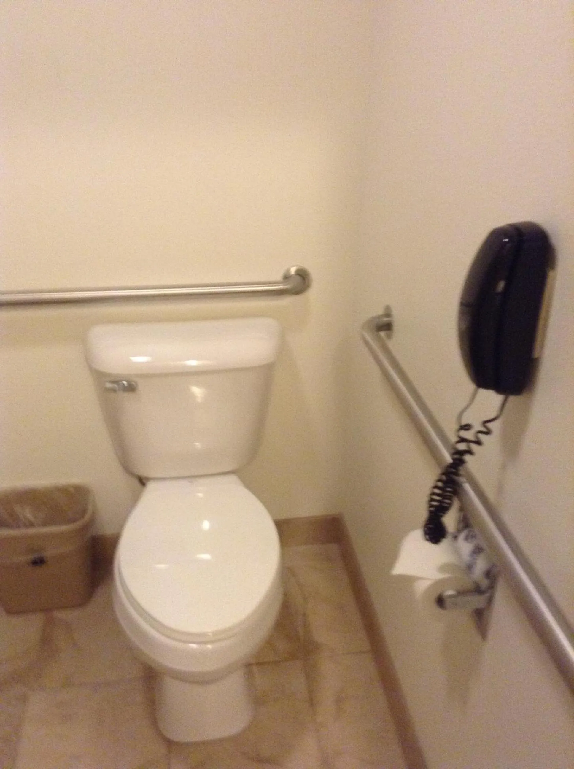 Toilet in Super 8 by Wyndham Cedar Falls