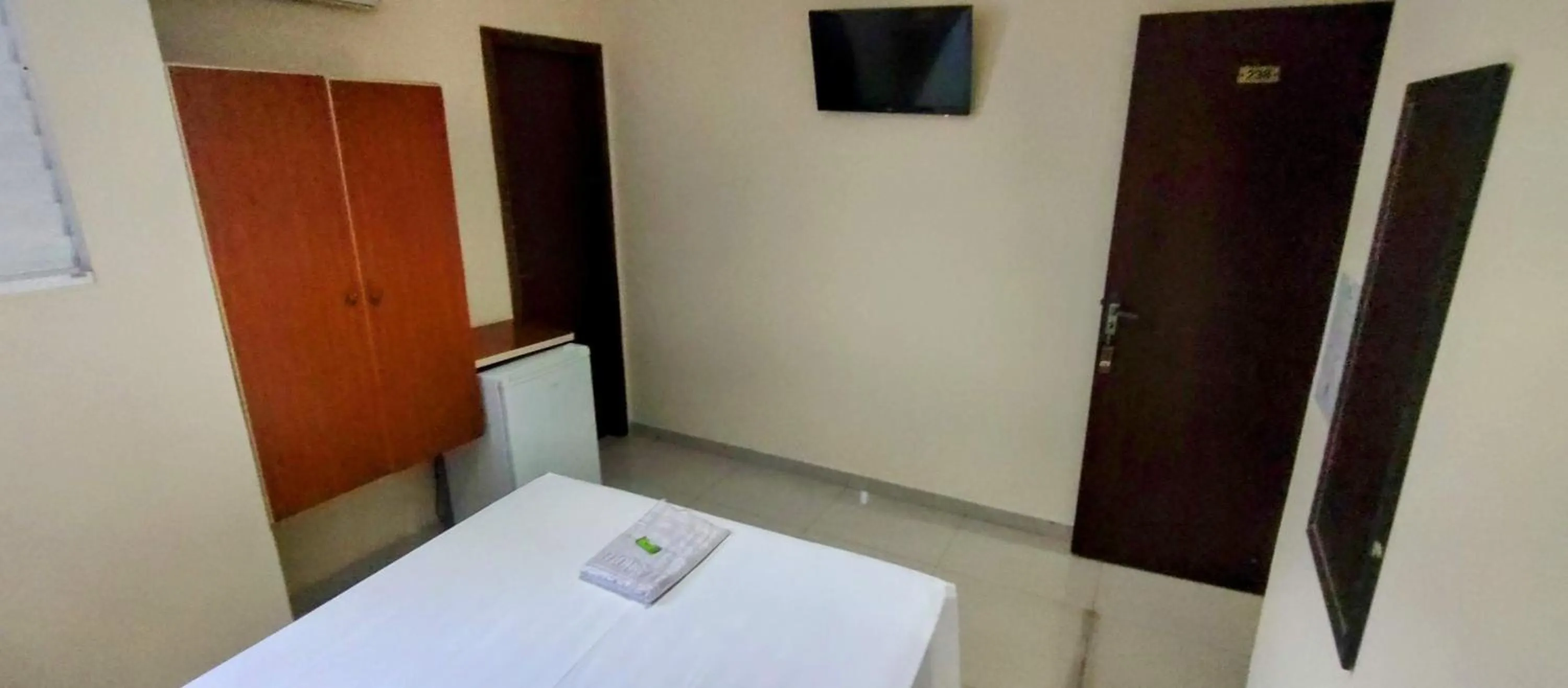 Bed in Aero Plaza Hotel