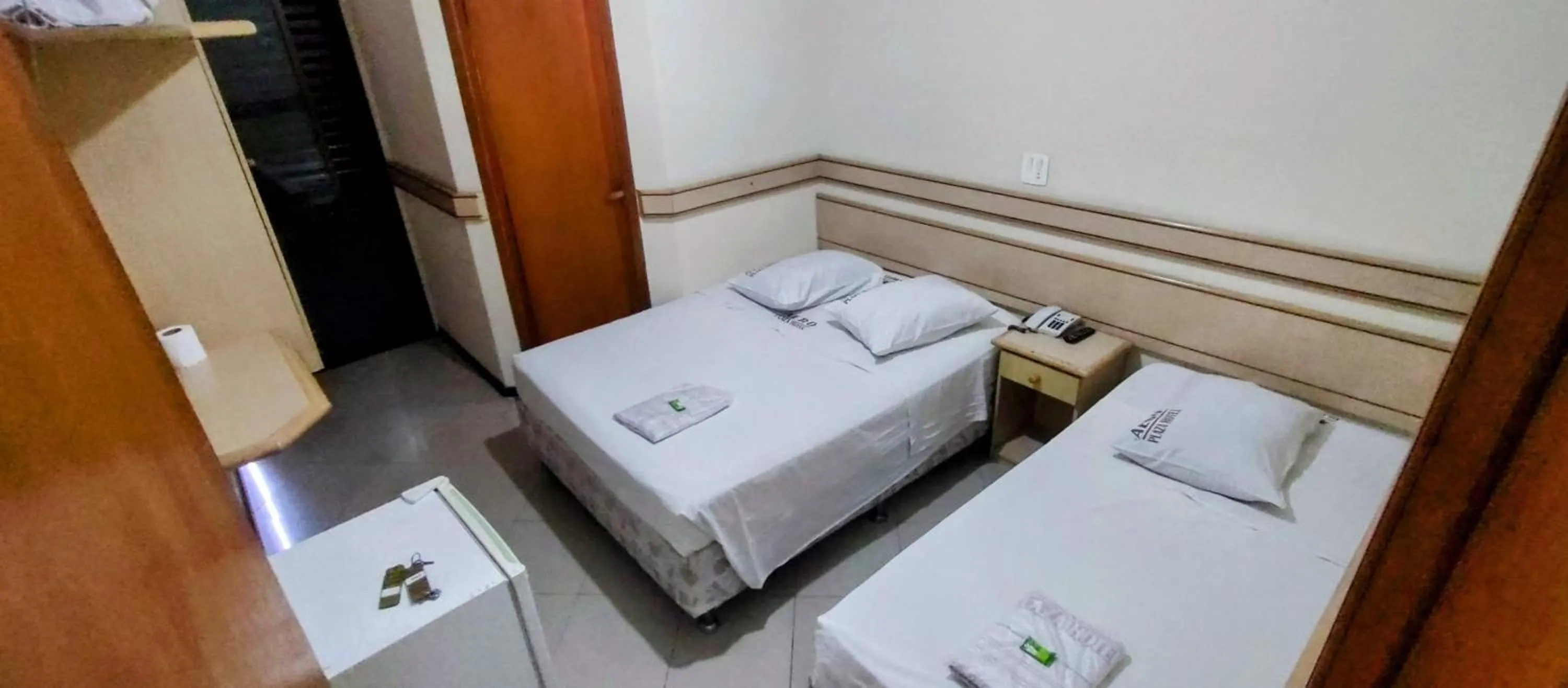 Bed in Aero Plaza Hotel