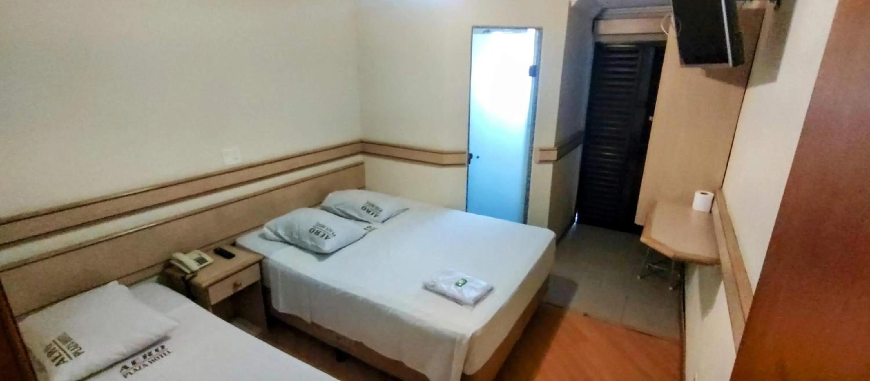 Bed in Aero Plaza Hotel