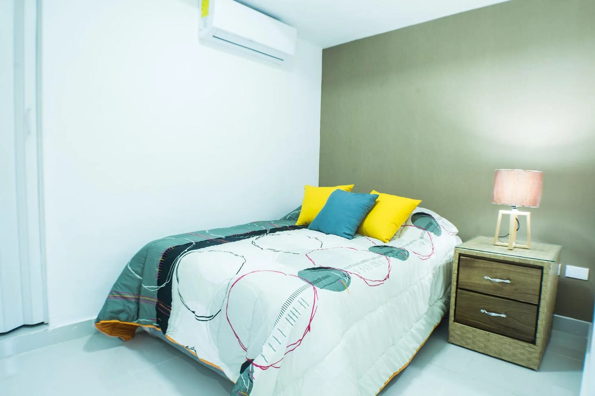 Bed in Malecon Premium Rooms & Hotel