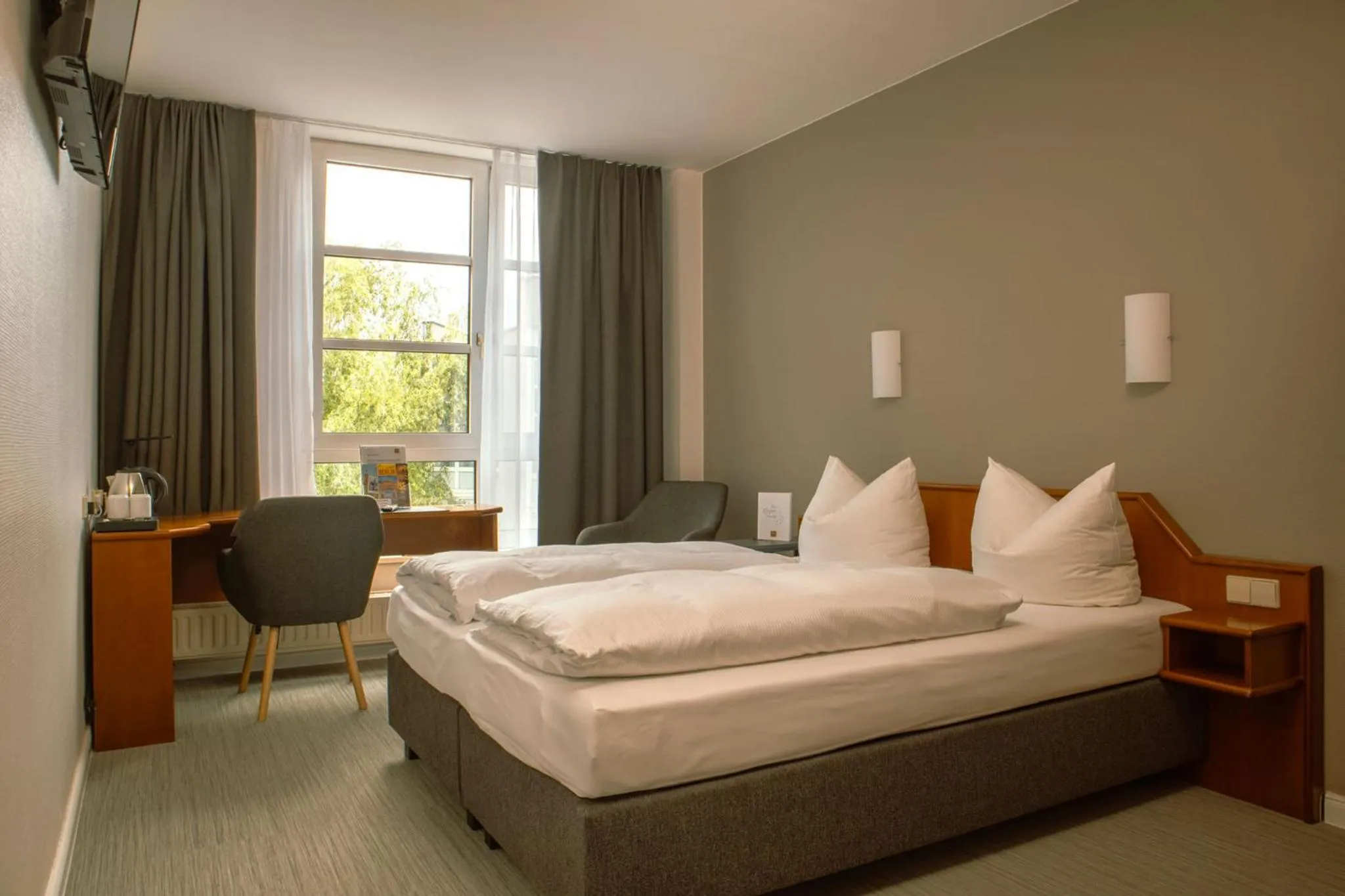 Photo of the whole room, Bed in SensCity Hotel Berlin Spandau