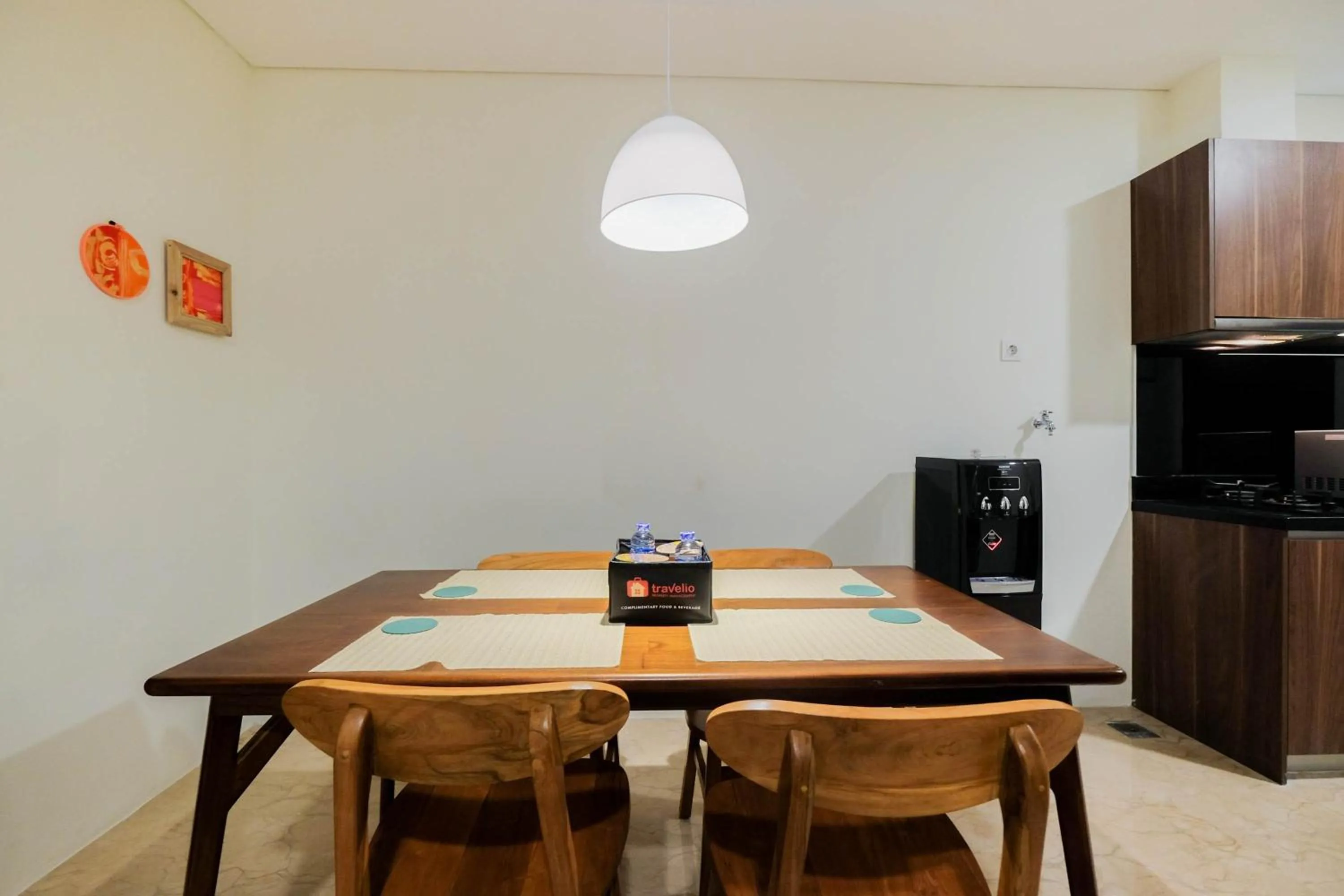 Dining area in 1BR Pancoran L'Avenue Comfy Apartment By Travelio