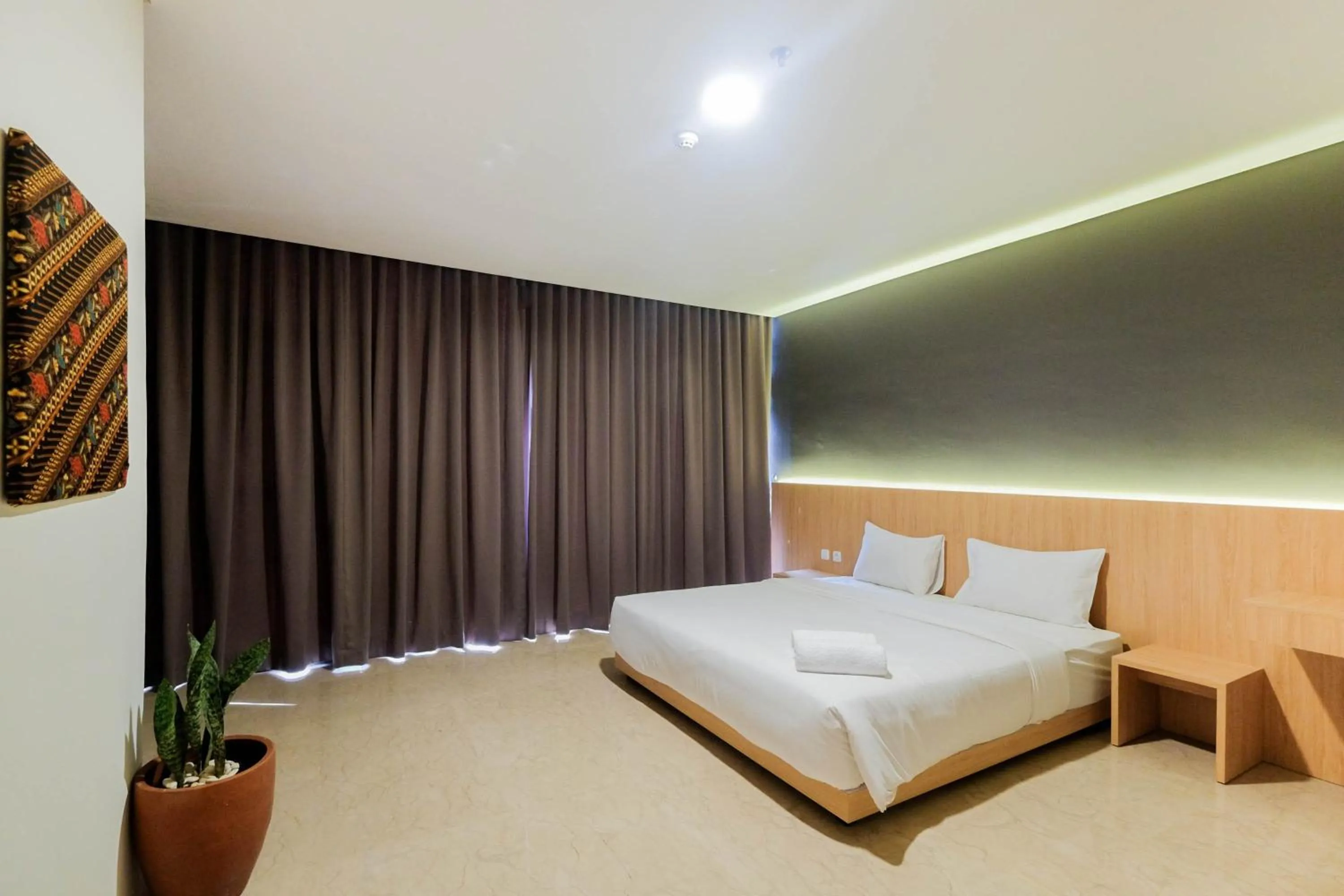 Bedroom, Bed in 1BR Pancoran L'Avenue Comfy Apartment By Travelio