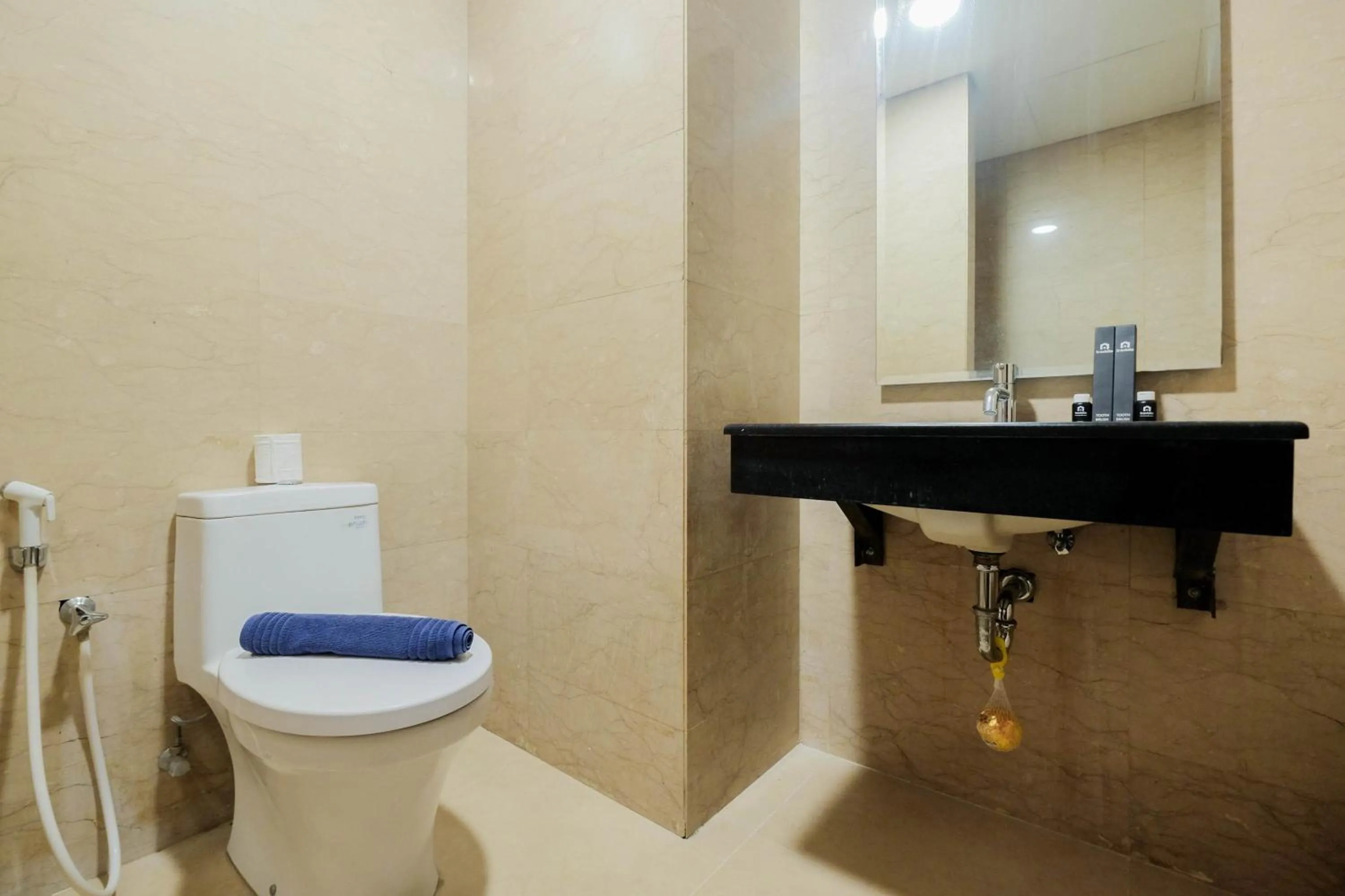 Bathroom in Comfy 3BR at L'Avenue Apartment Pancoran By Travelio