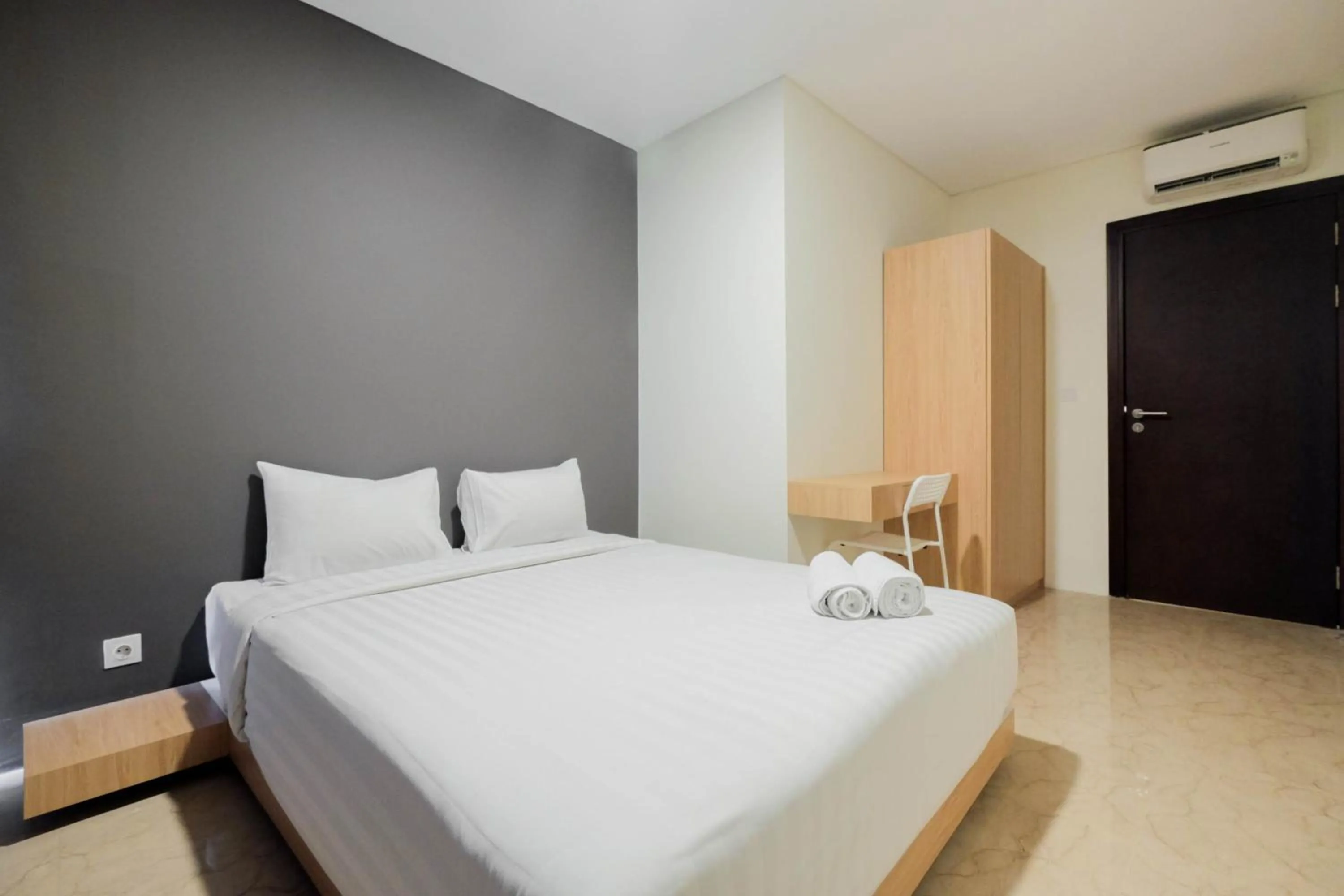 Bedroom, Bed in Comfy 3BR at L'Avenue Apartment Pancoran By Travelio