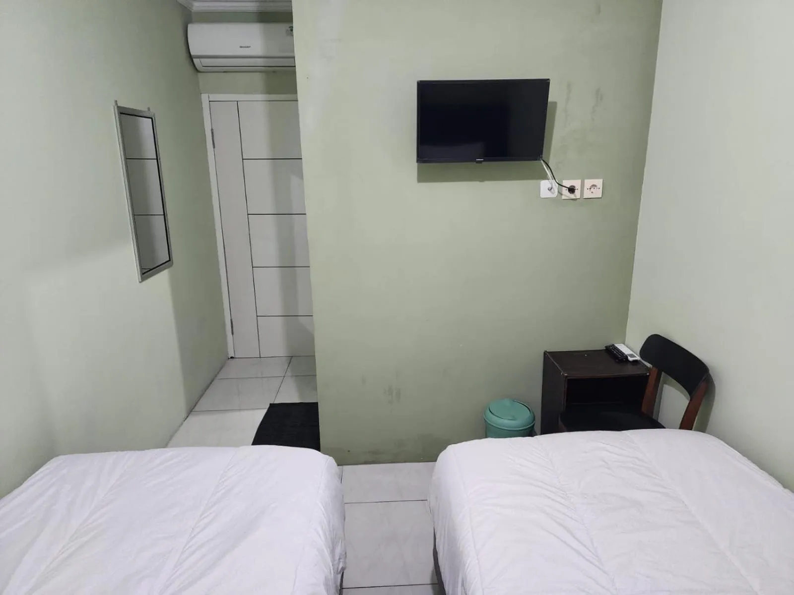 Bed in Omah Pandhoek Family Syariah by Stayku