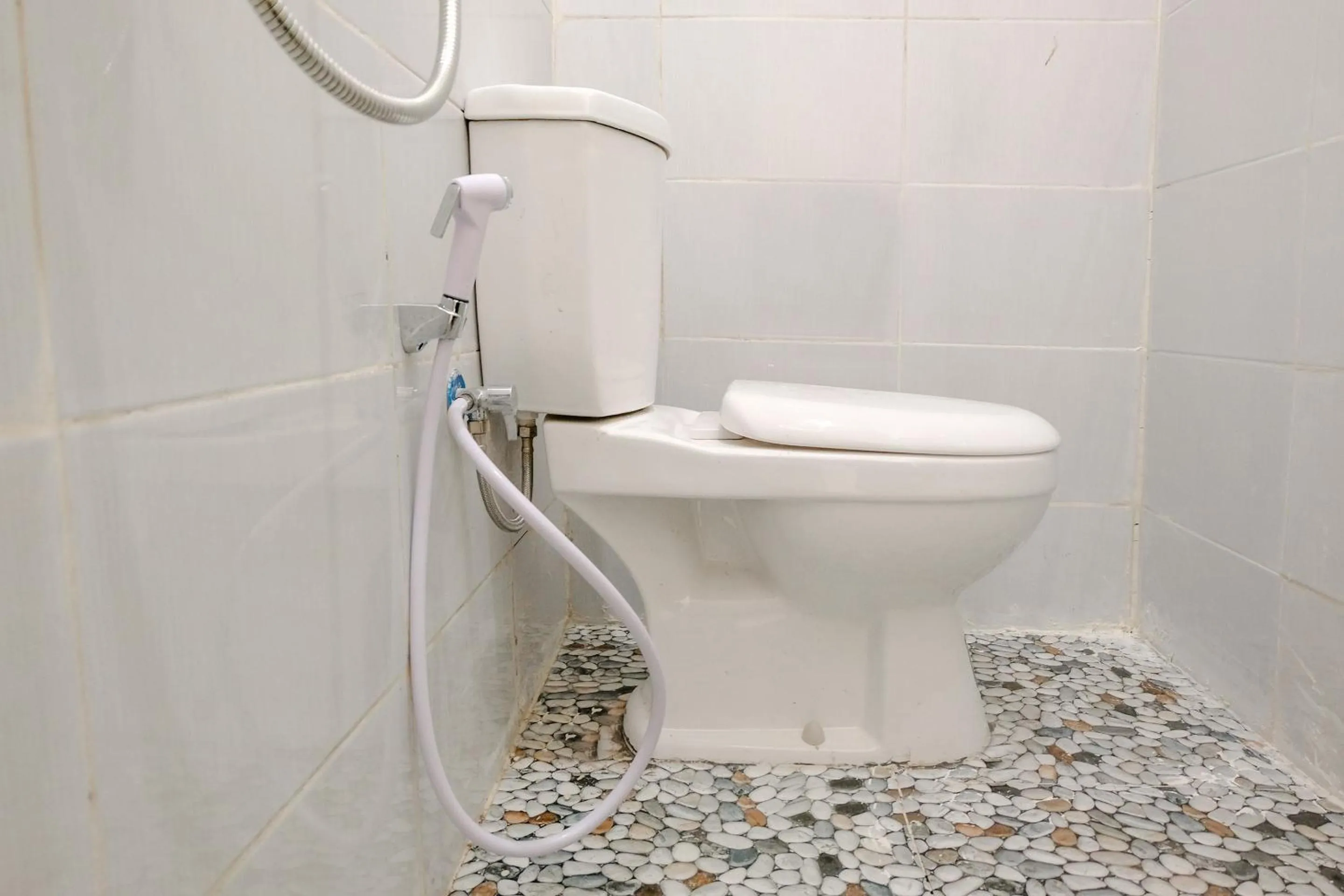 Bathroom in Omah Pandhoek Family Syariah by Stayku