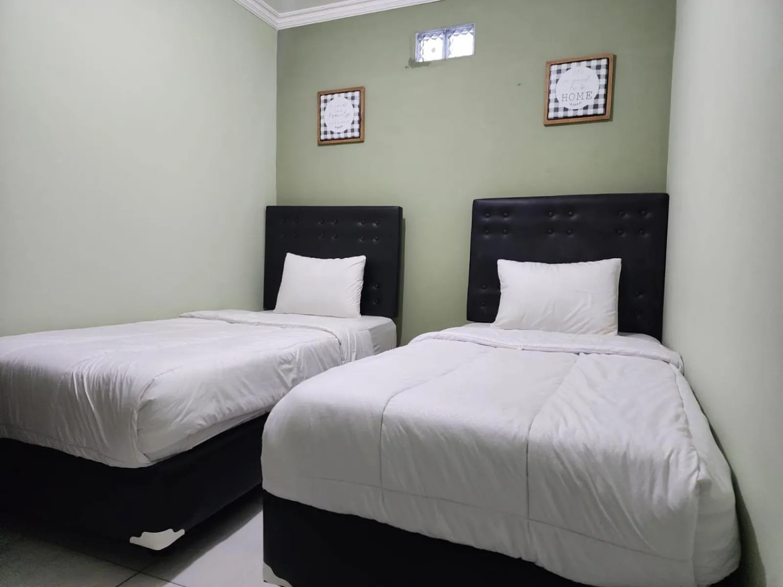 Bed in Omah Pandhoek Family Syariah by Stayku