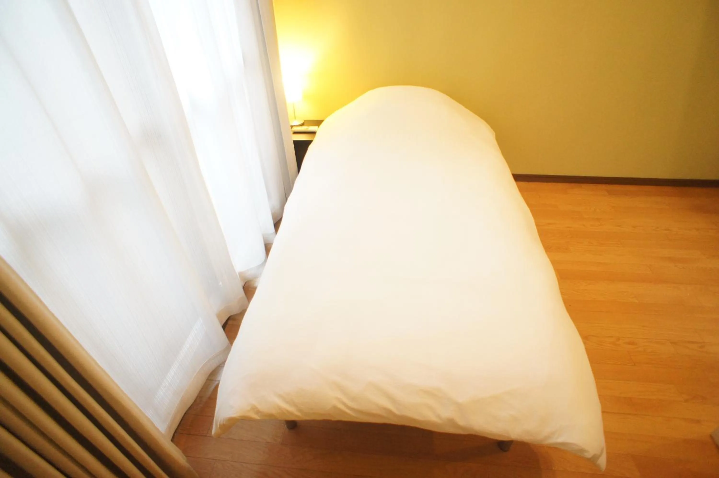 Bed in Plusone Nishikoen