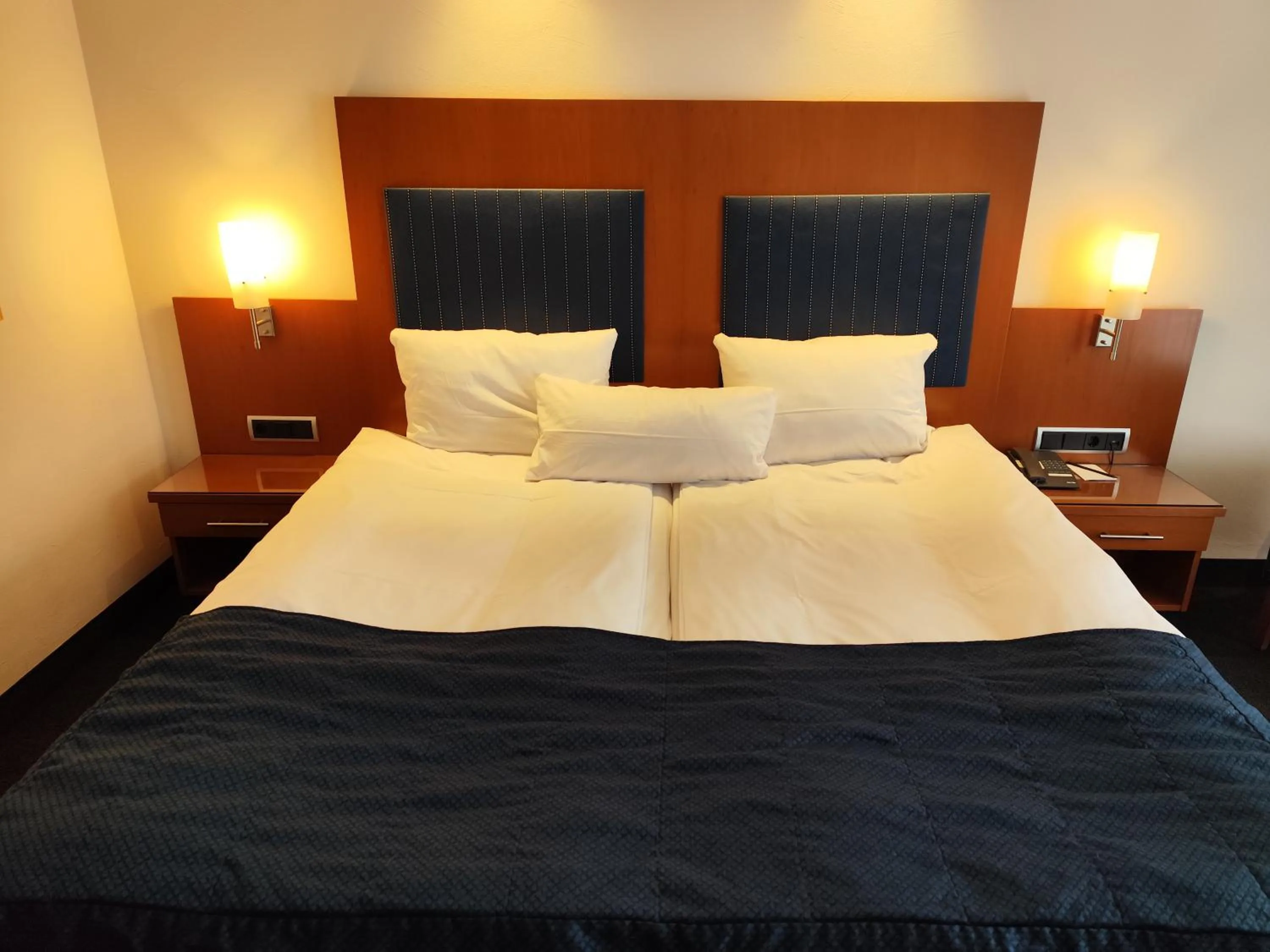 Photo of the whole room, Bed in Hotel Erzgiesserei Europe