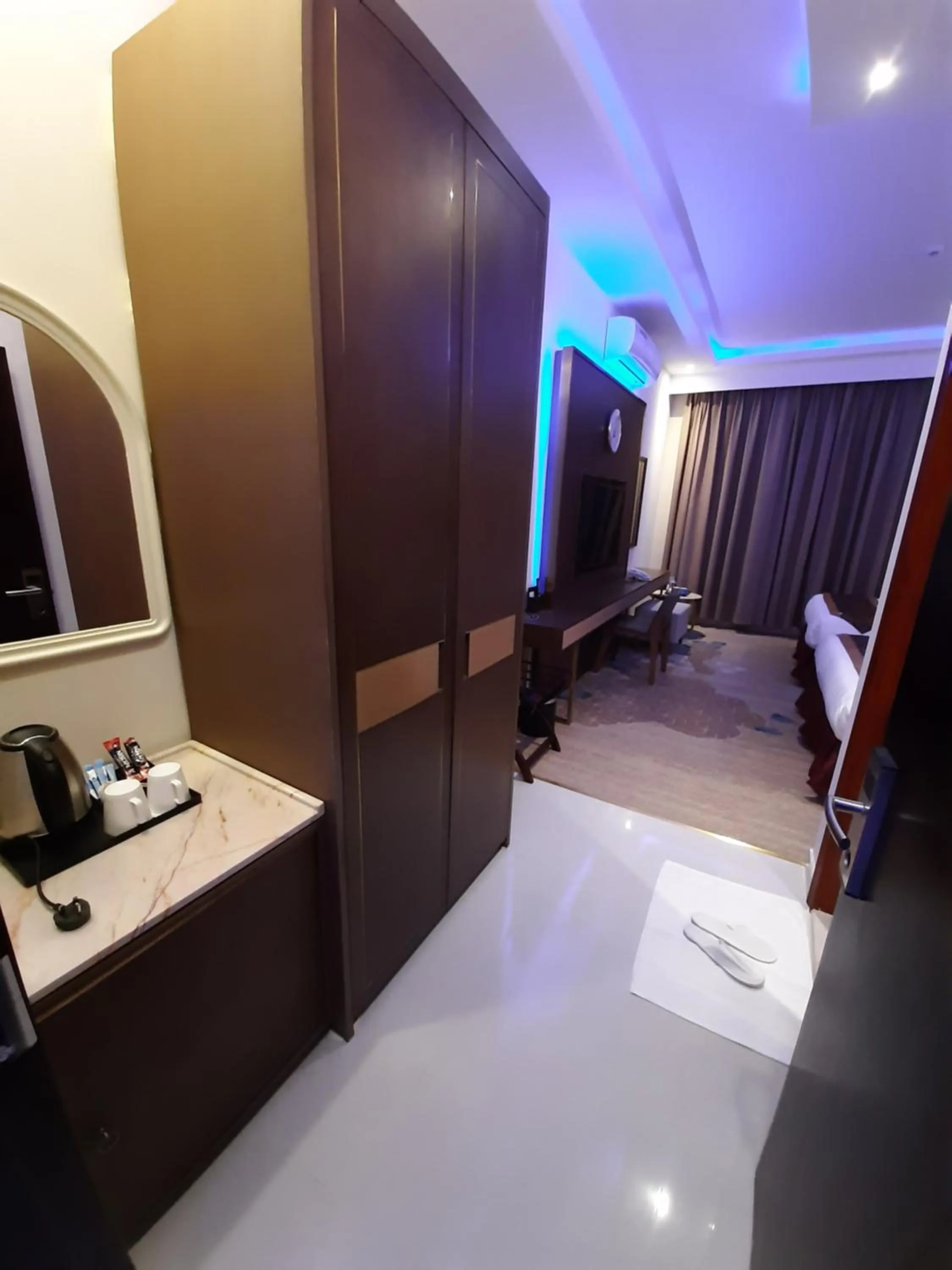 Bed in Qasr Alshamal Hotel