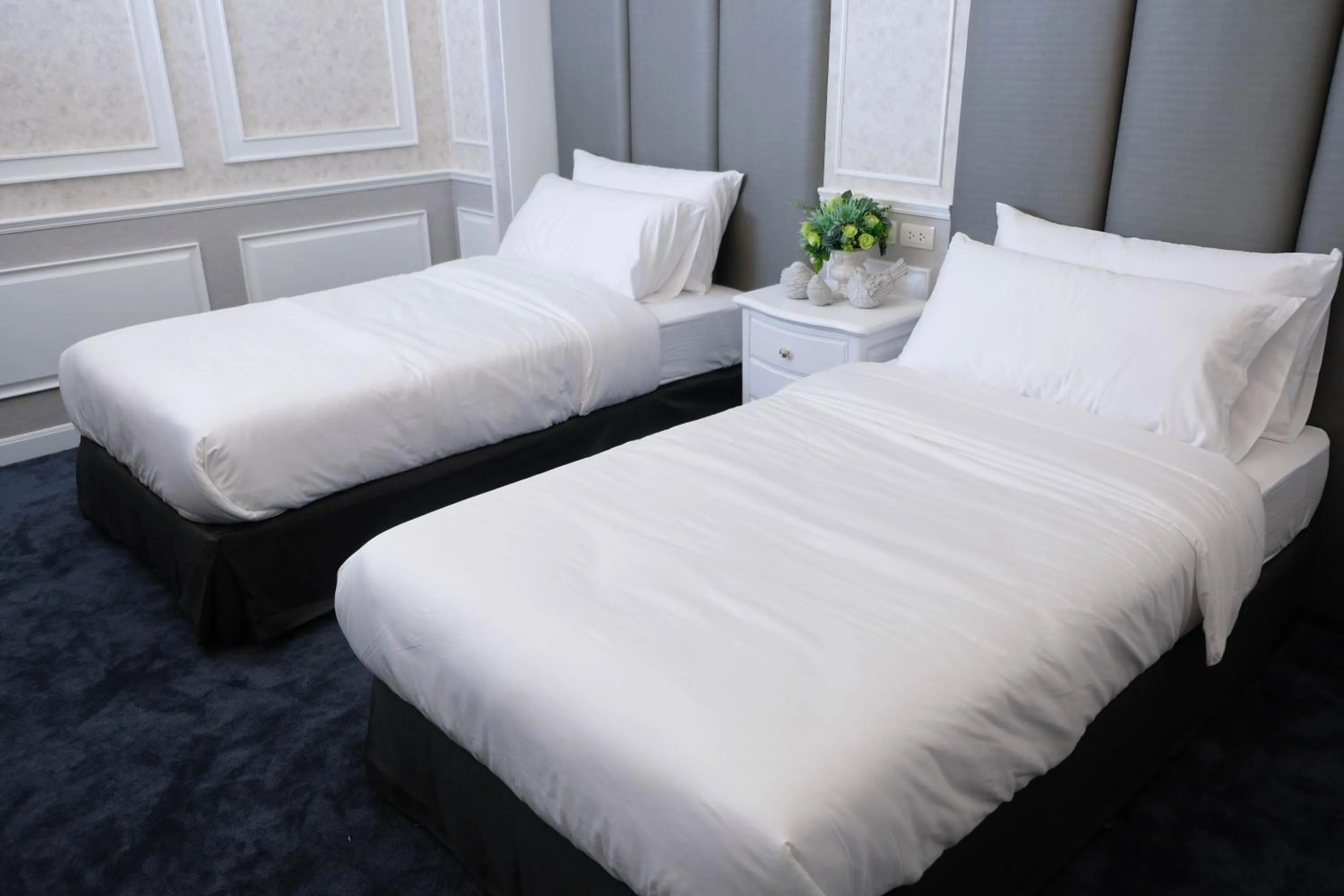 Bed in VARIMANTRA HOTEL