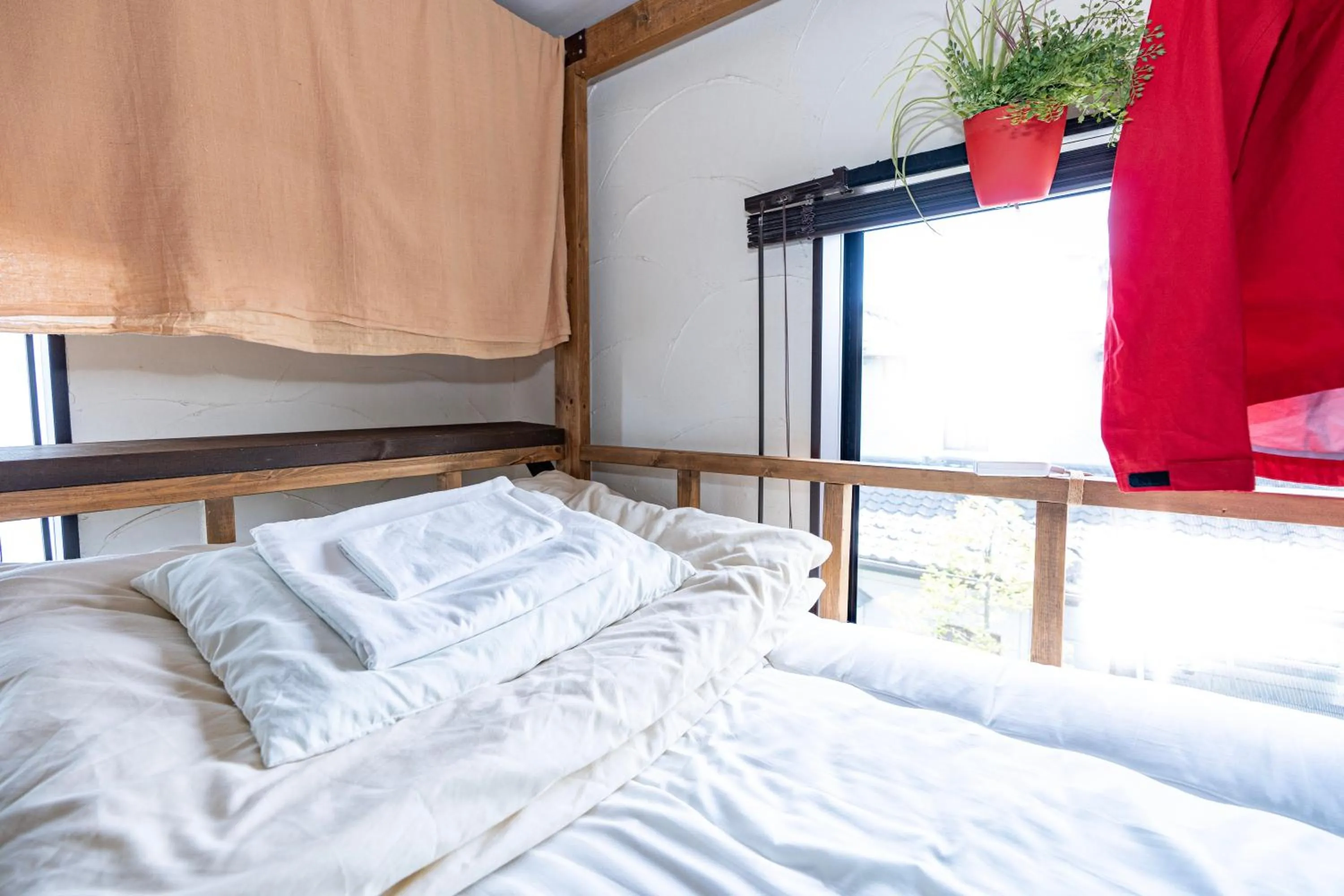 Bed in Sendai Guest House UMEBACHI