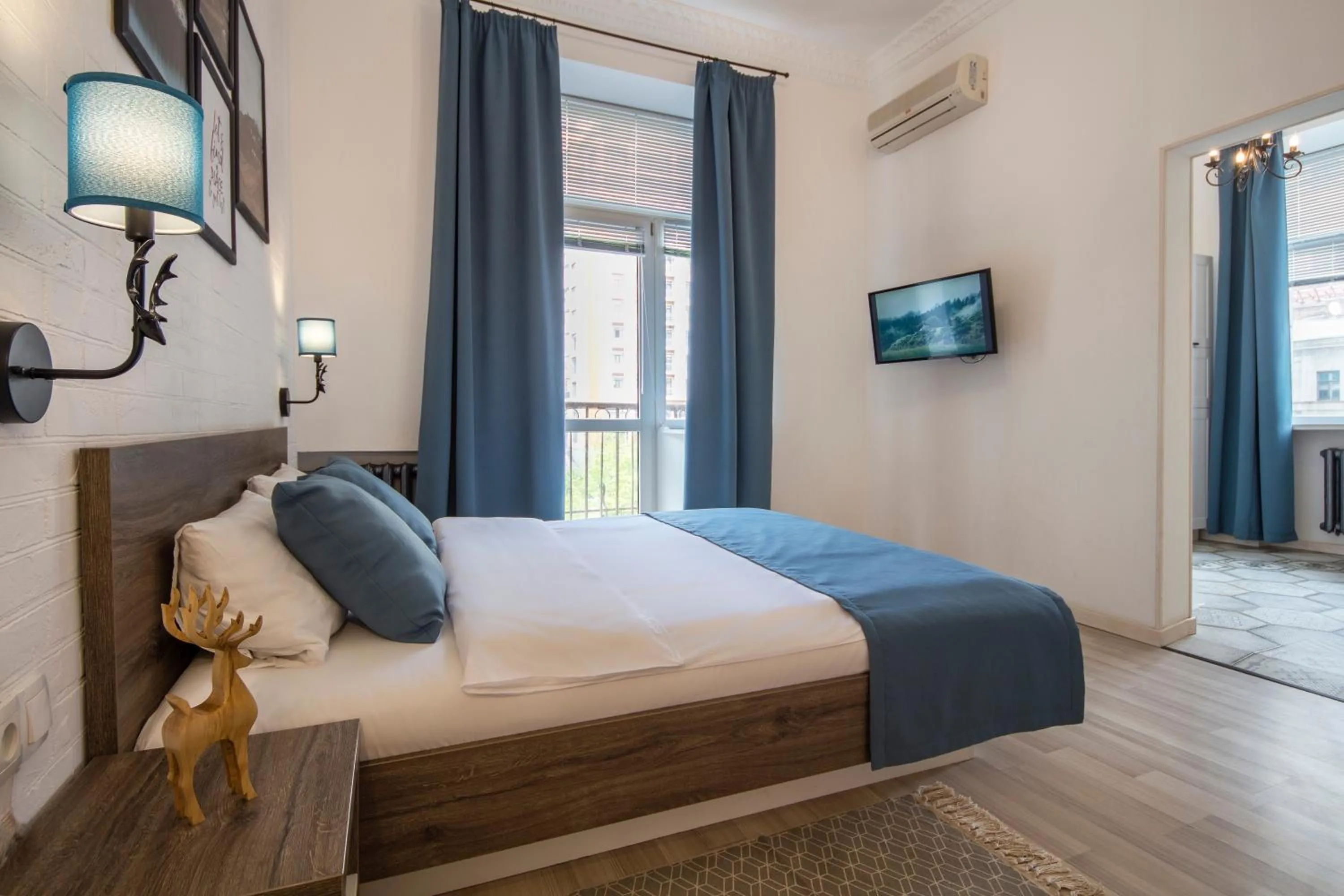 Bed in Scandinavian Apartments