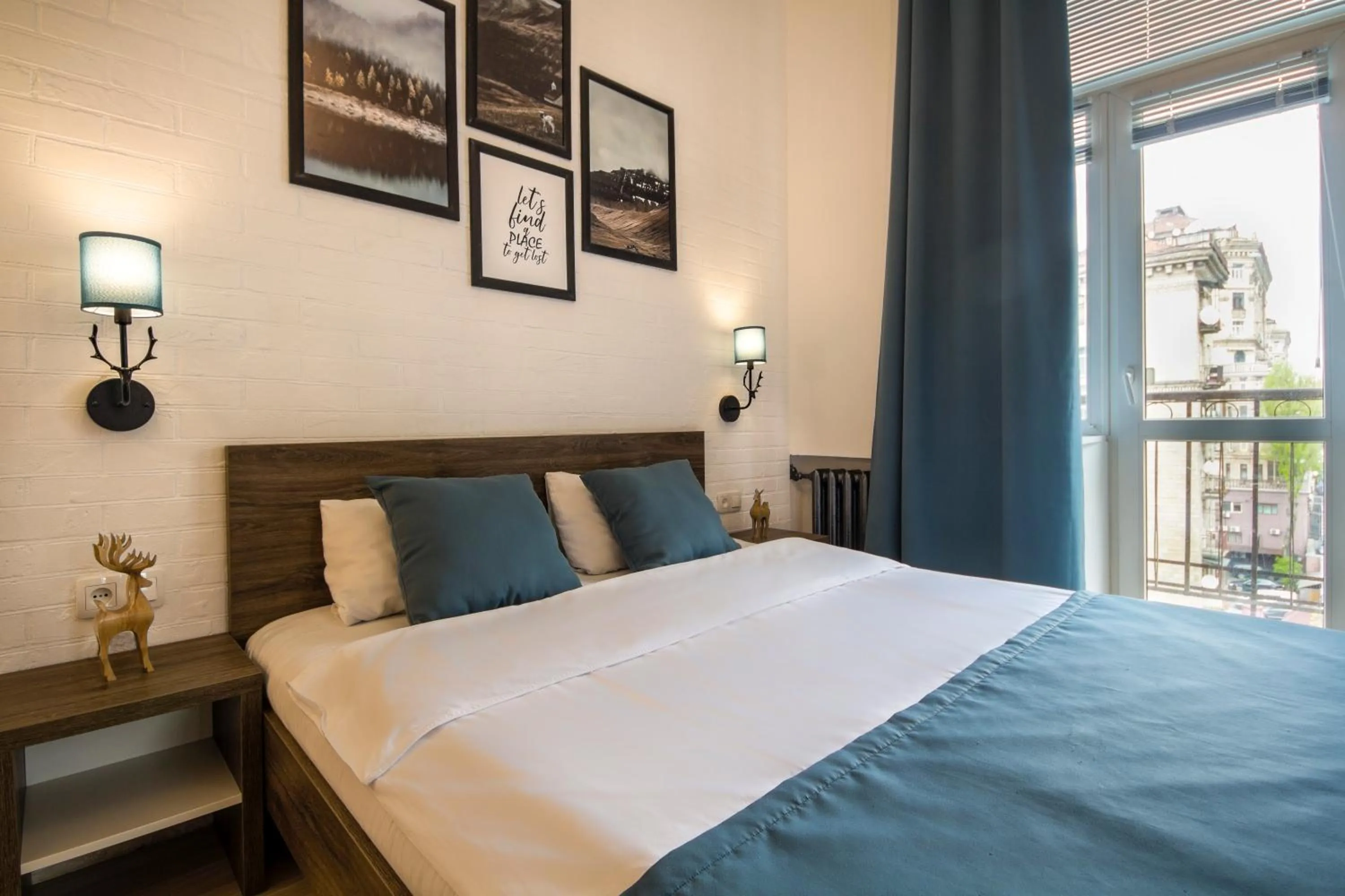 Bed in Scandinavian Apartments