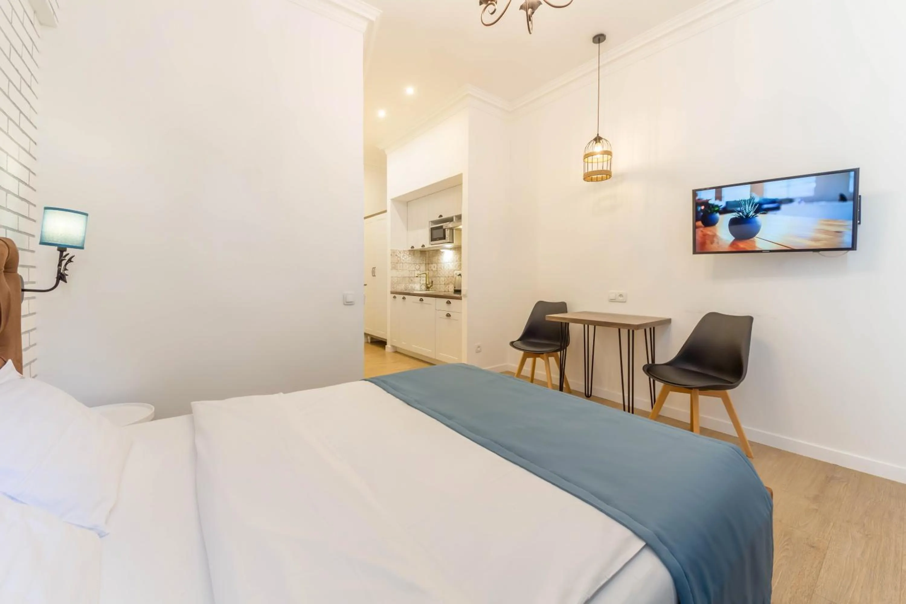 Bed in Scandinavian Apartments