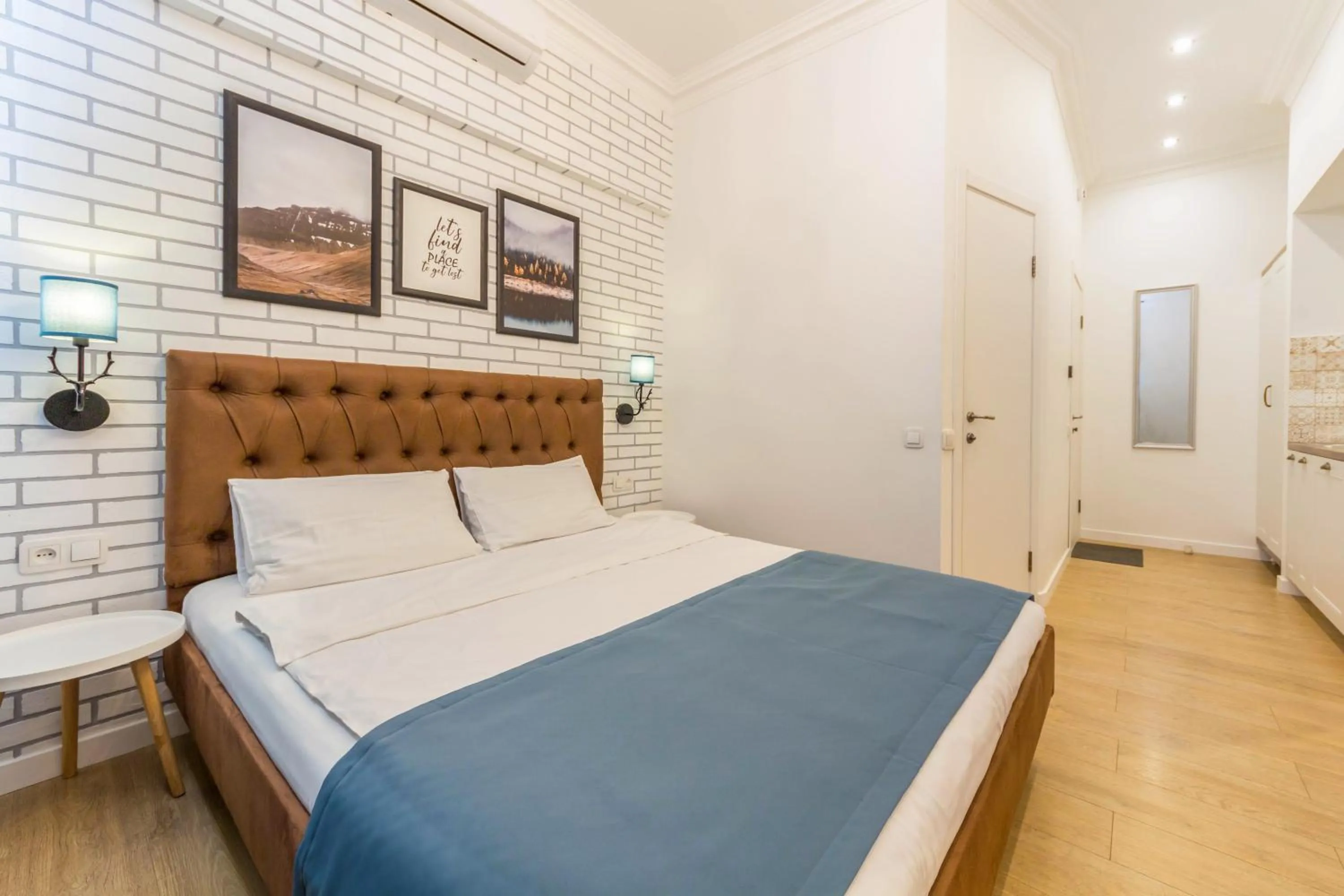 Bed in Scandinavian Apartments