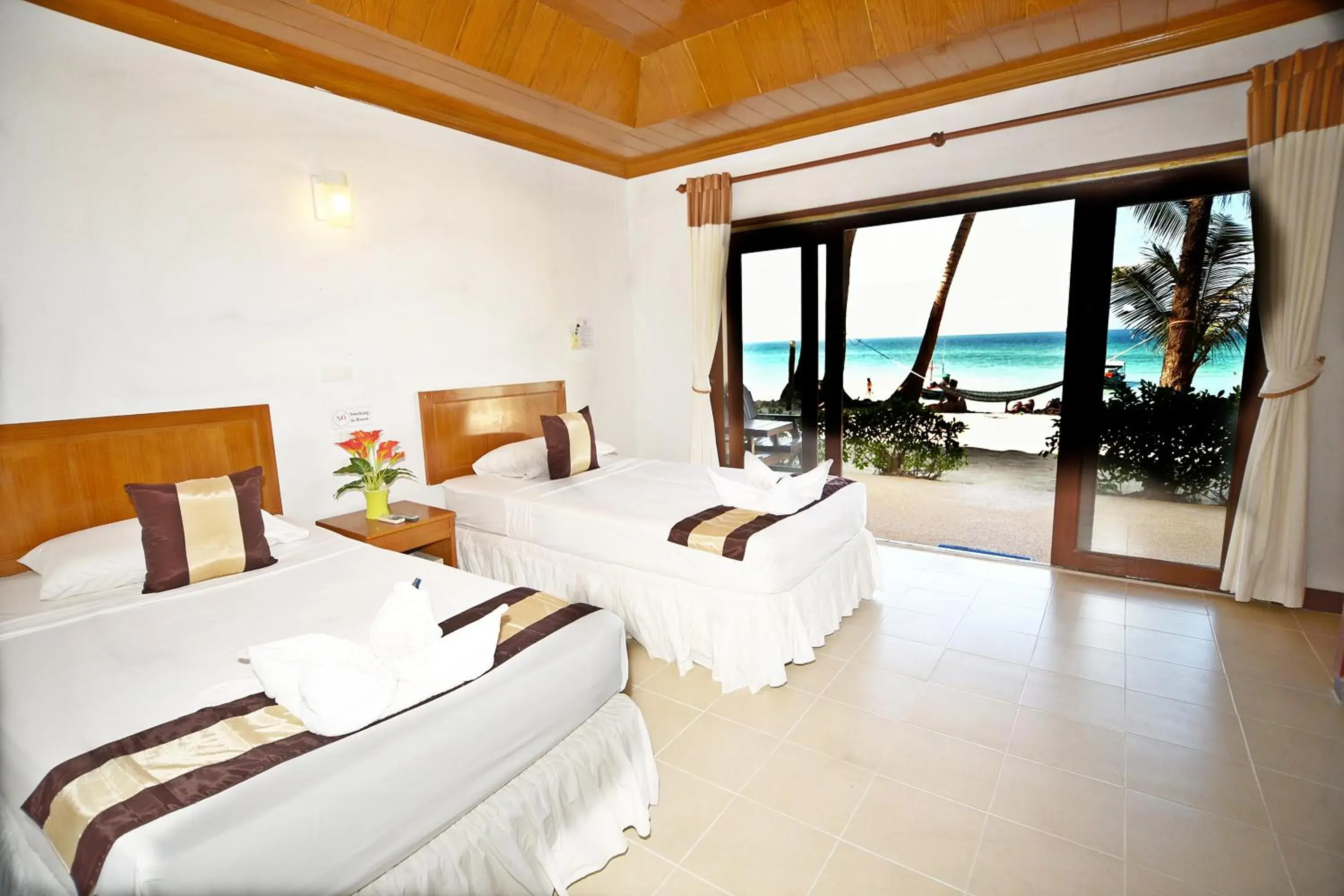 Standard Twin Rooms with Fan in Haad Khuad Resort Standard Twin Rooms with Fan in Haad Khuad Resort