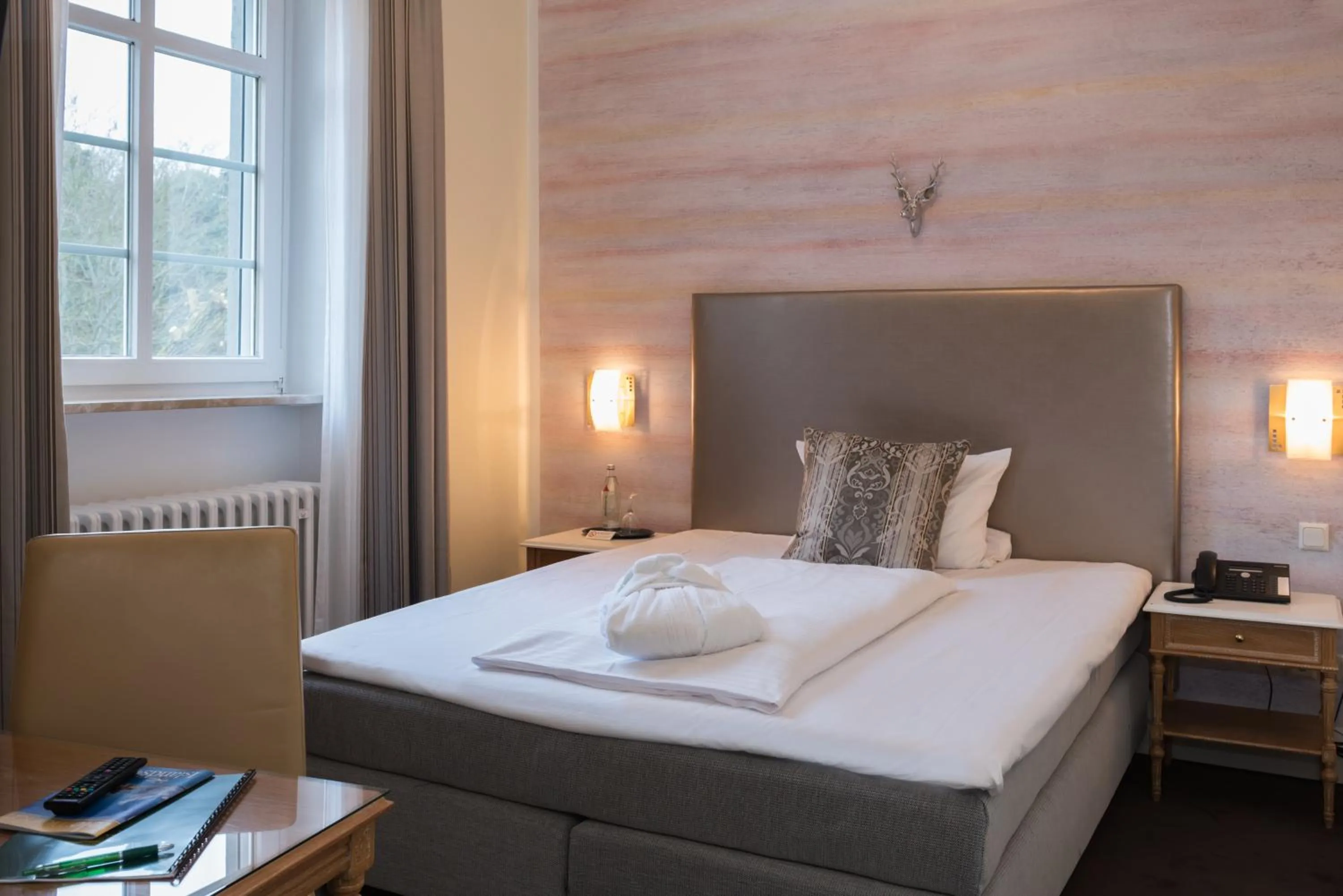 Photo of the whole room, Bed in Jagdschloss Hotel Niederwald