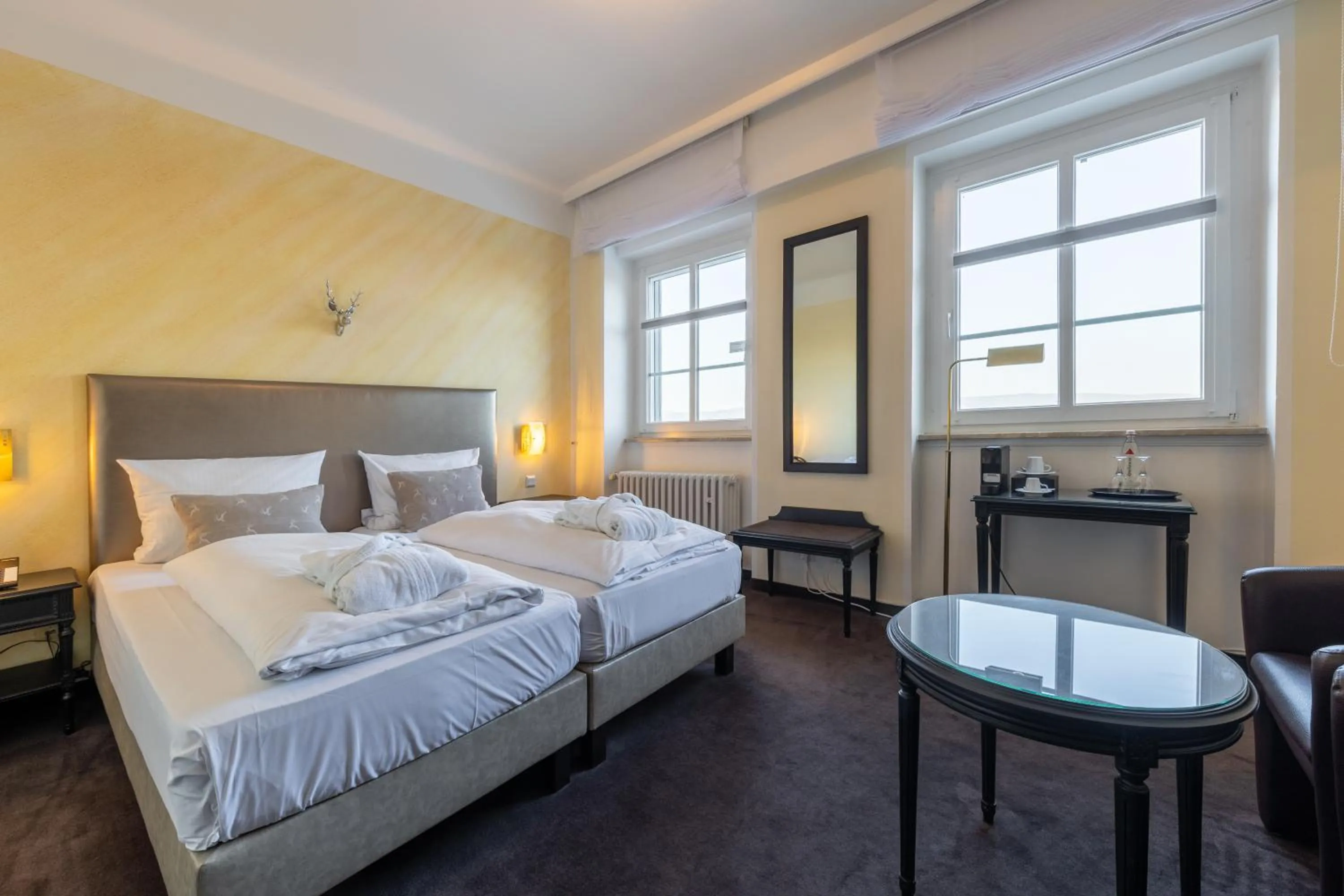 Photo of the whole room, Bed in Jagdschloss Hotel Niederwald