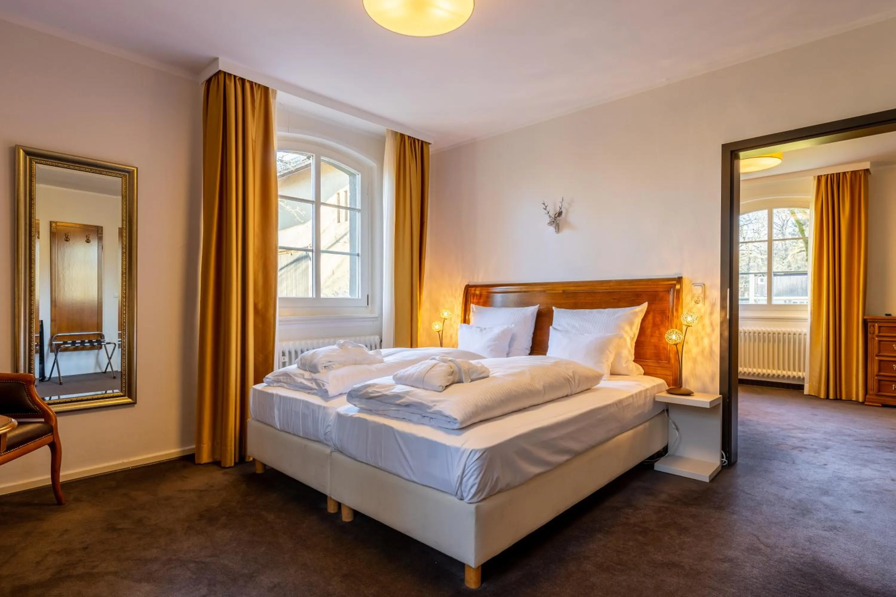 Photo of the whole room, Bed in Jagdschloss Hotel Niederwald