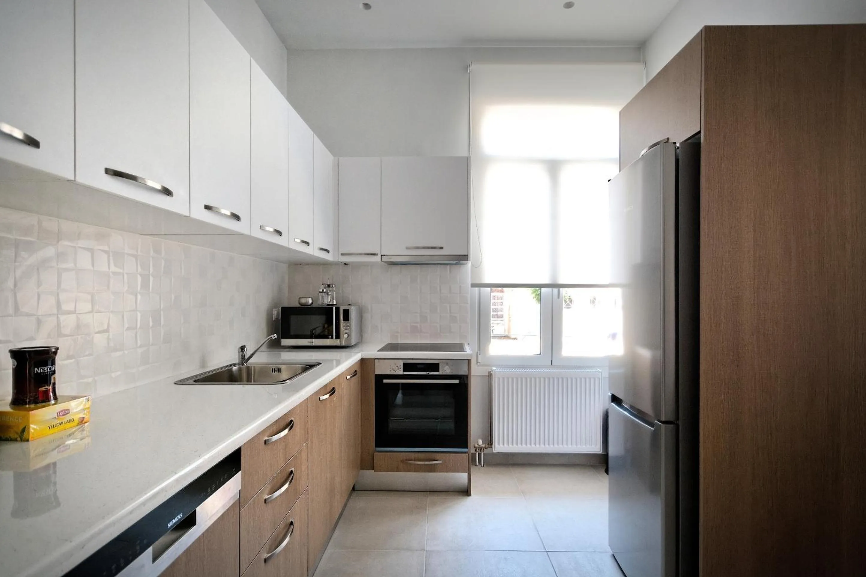 Kitchen or kitchenette in Poseidon Residence