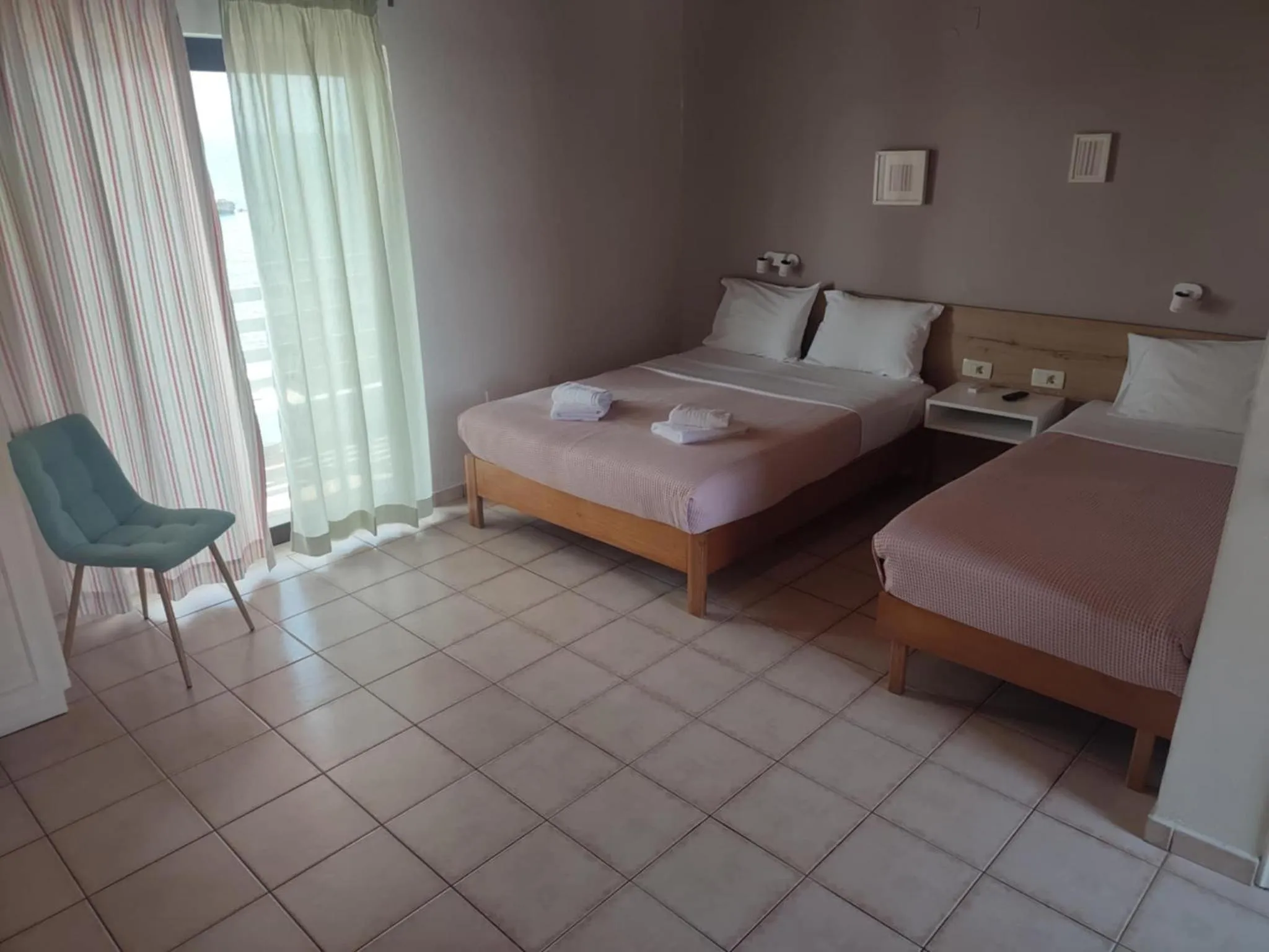 Bed in Posidonio Hotel