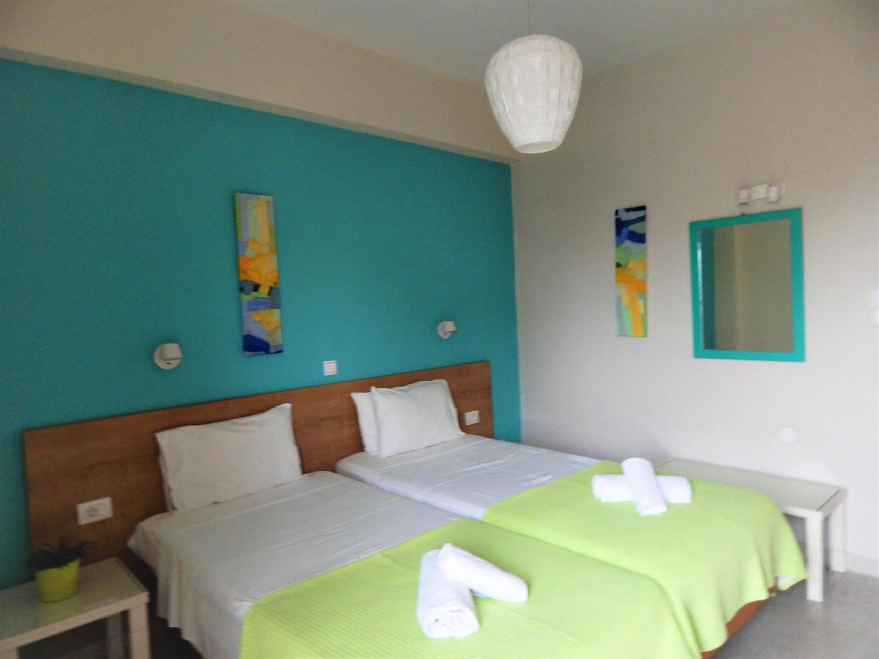 Bed in Posidonio Hotel