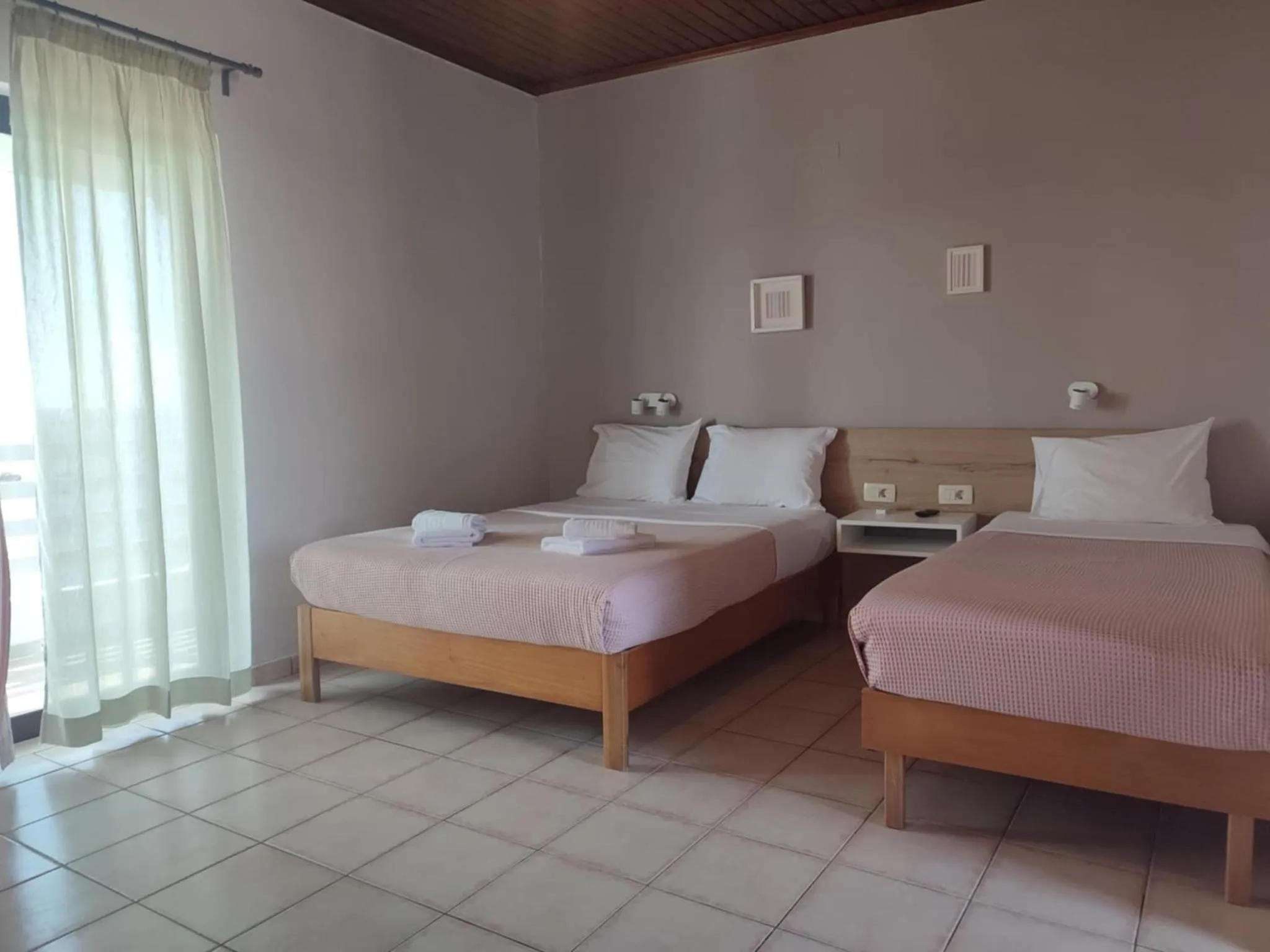 Bed in Posidonio Hotel