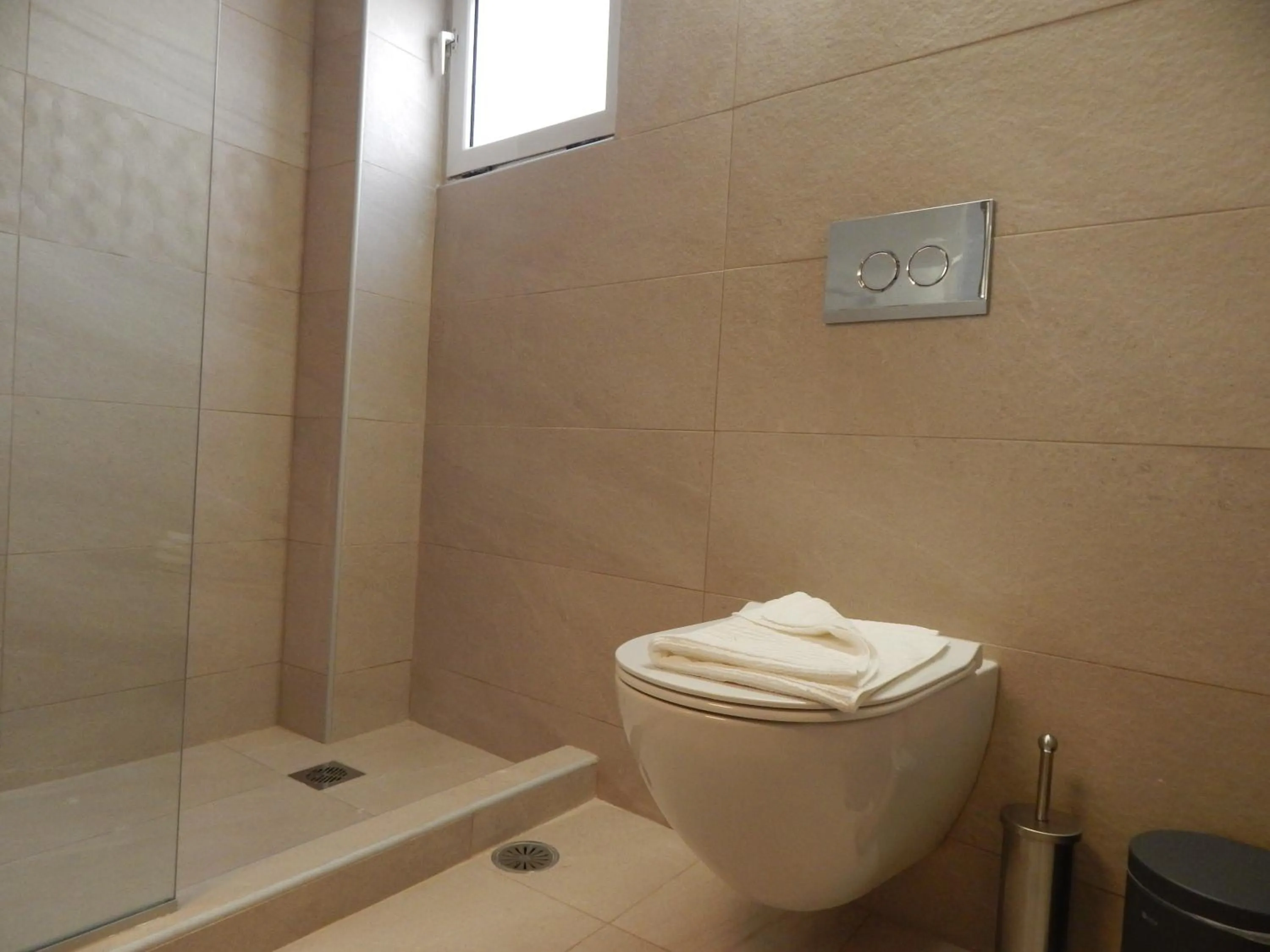 Toilet in Posidonio Hotel