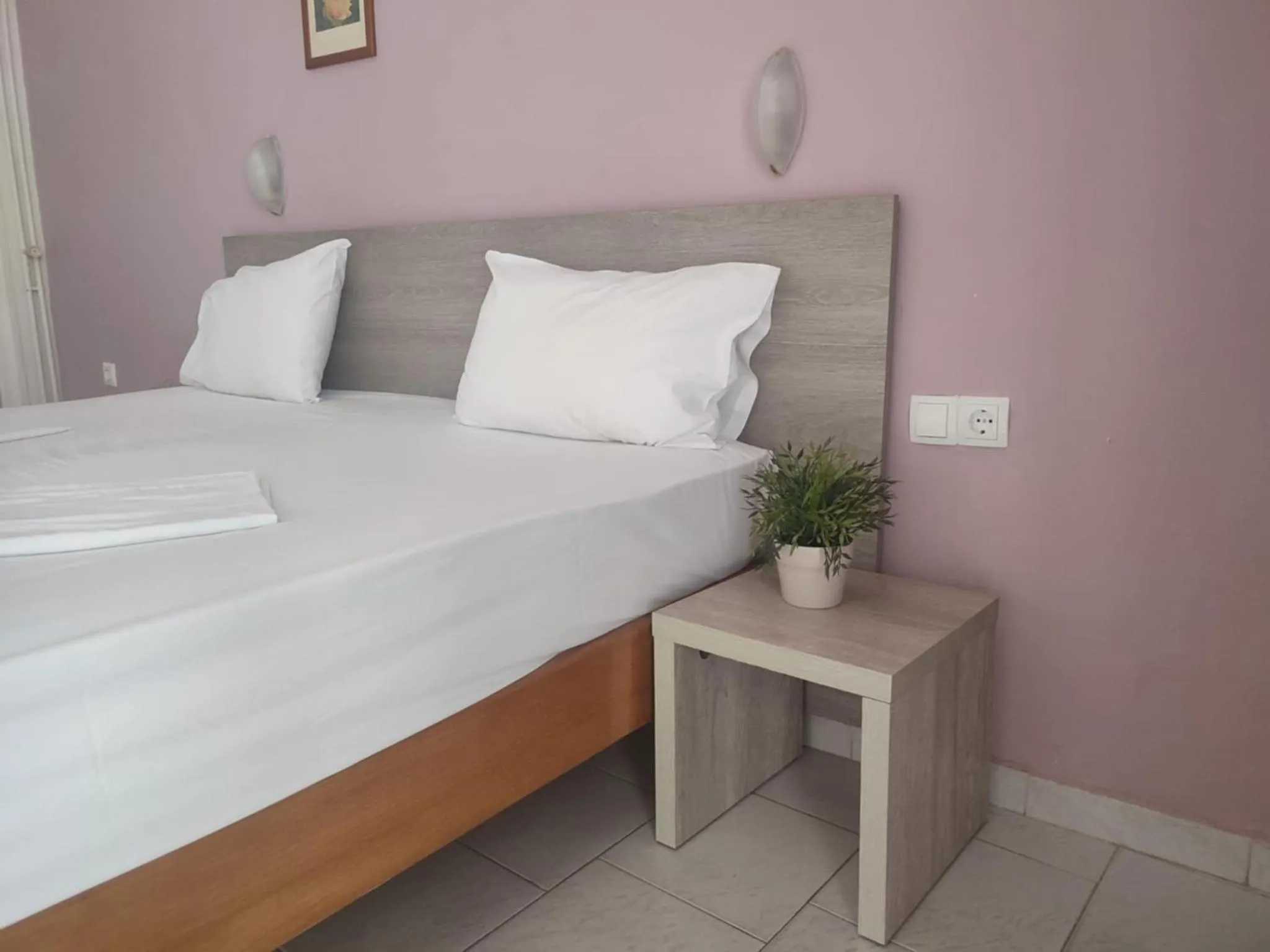 Bed in Posidonio Hotel