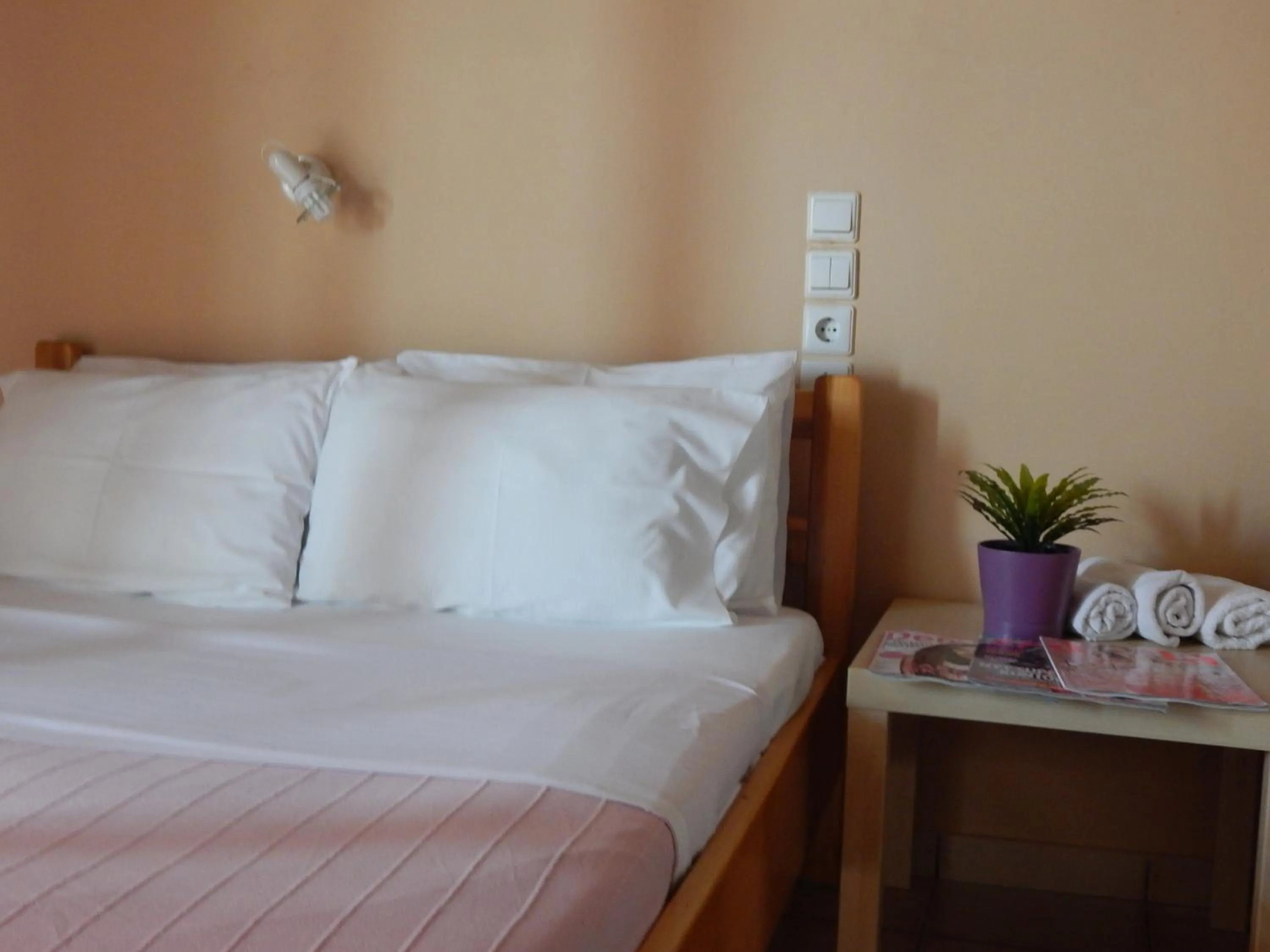 Bed in Posidonio Hotel