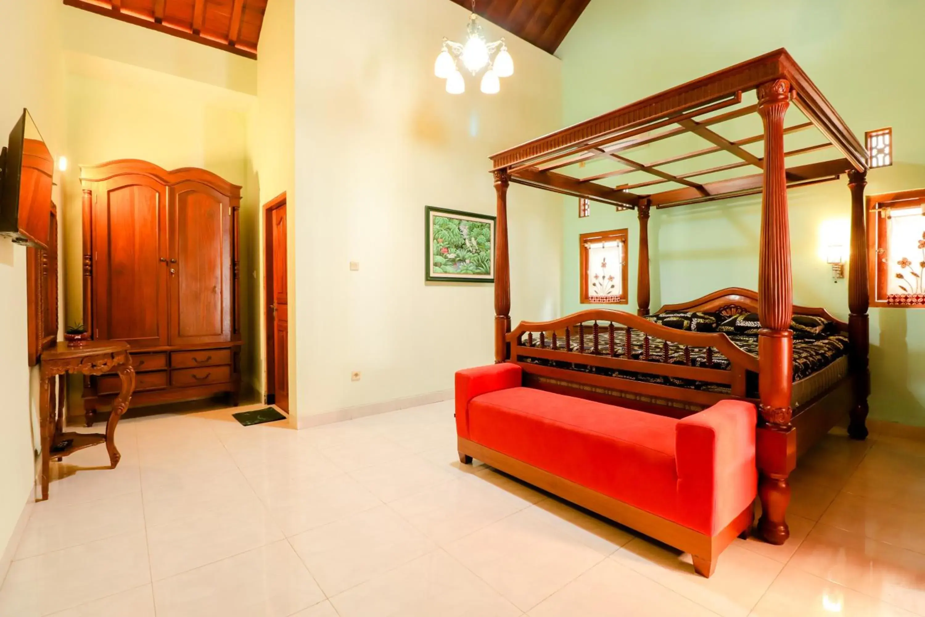 Deluxe Room (2 Adults + 1 Child) in Griya 90TR Syariah Deluxe Room (2 Adults + 1 Child) in Griya 90TR Syariah