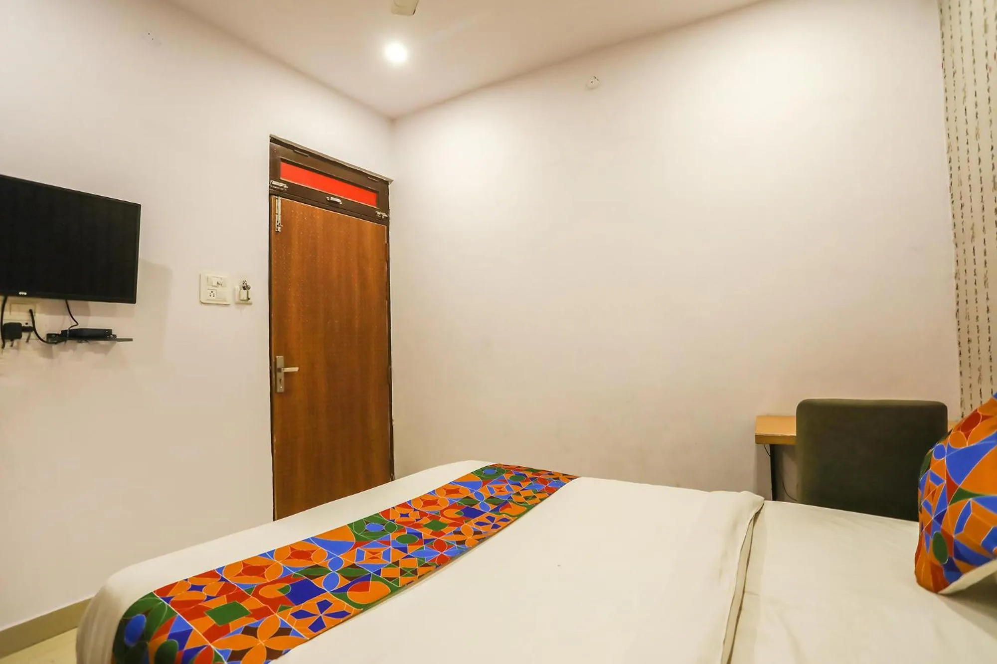 Bed in FabHotel Pranjul Inn