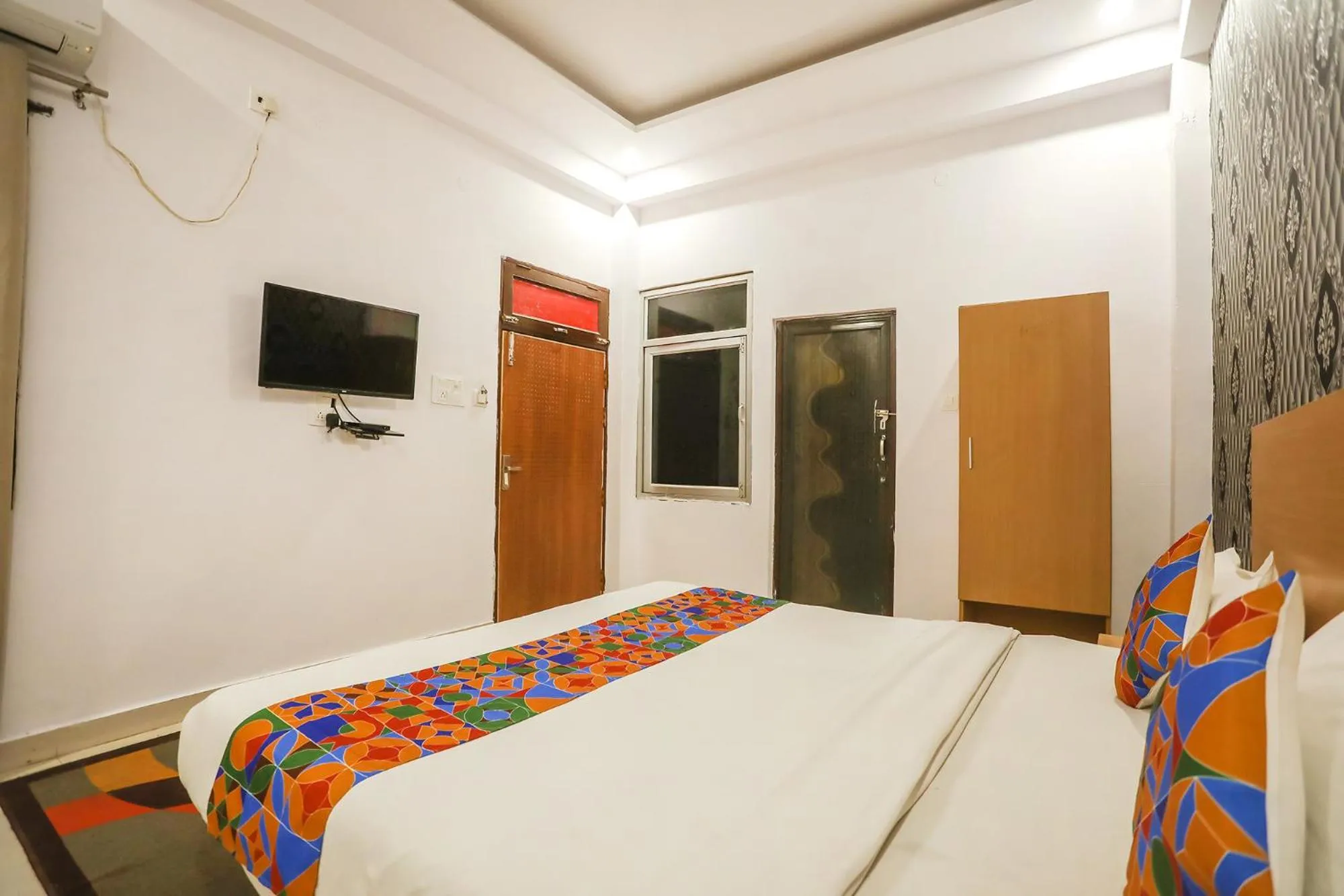 Bed in FabHotel Pranjul Inn