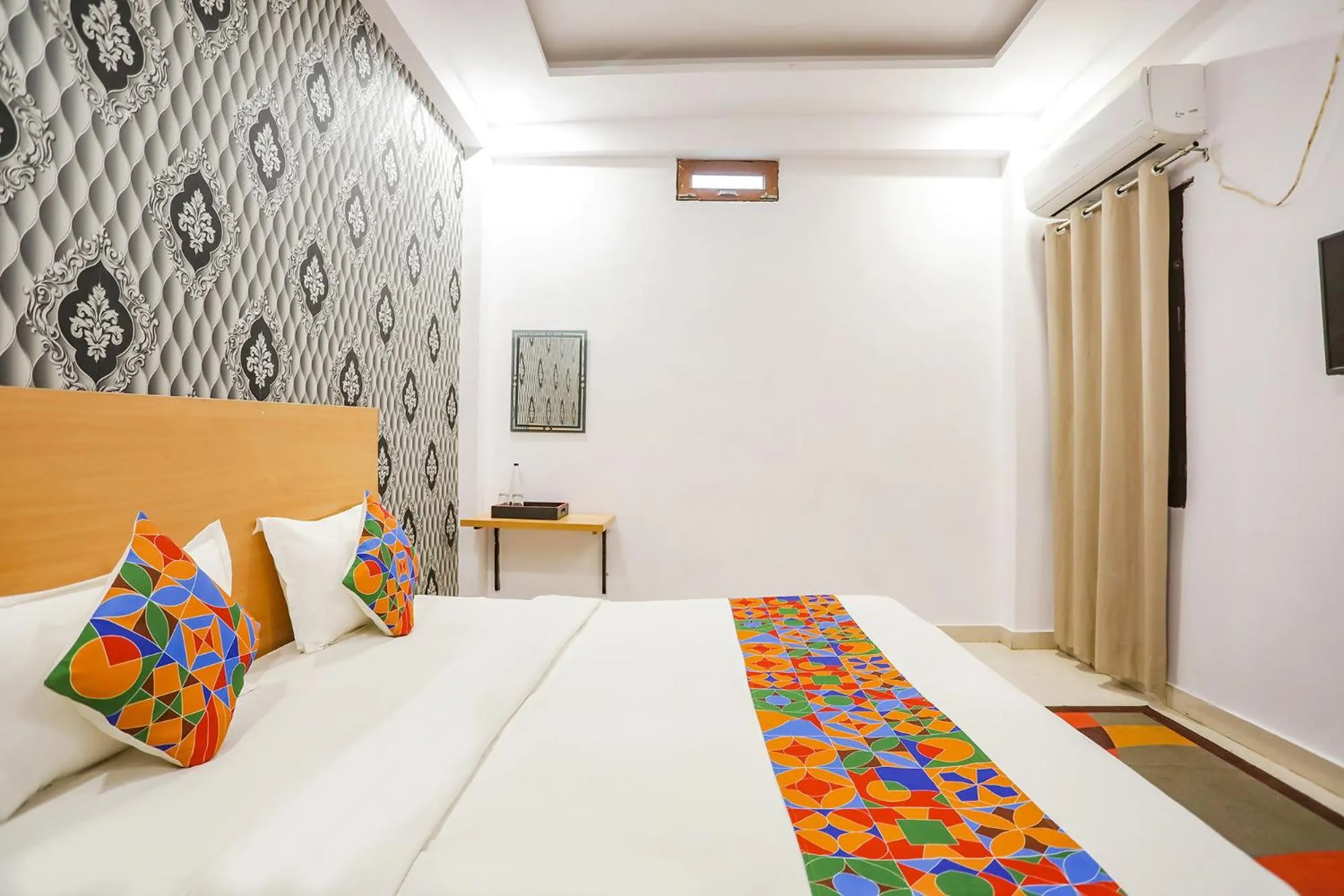 Bed in FabHotel Pranjul Inn