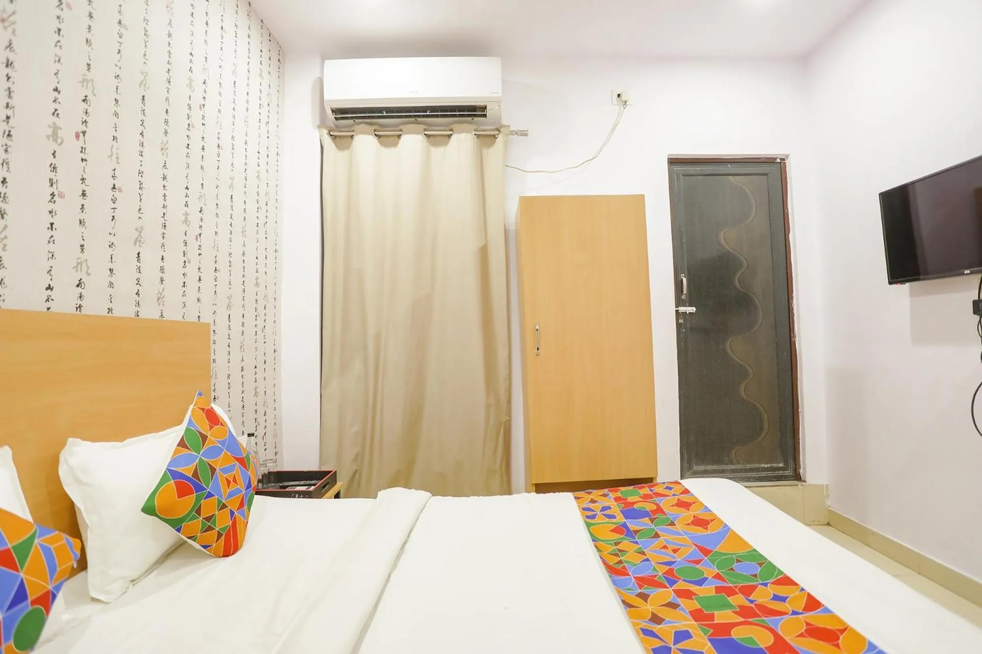 Bed in FabHotel Pranjul Inn