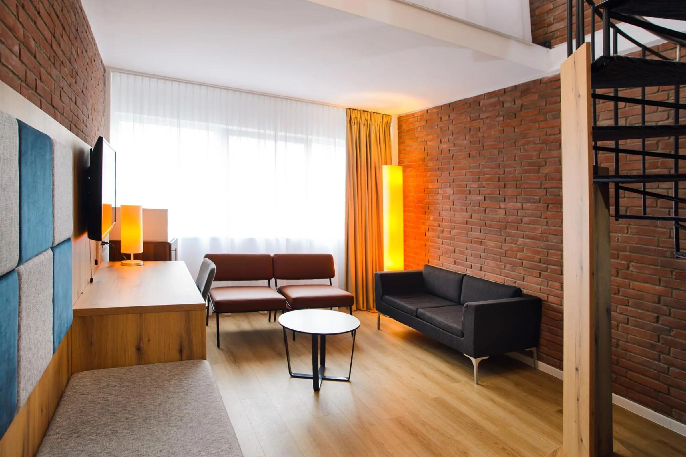 Living room, Bed in Tulip Inn Ludwigshafen City