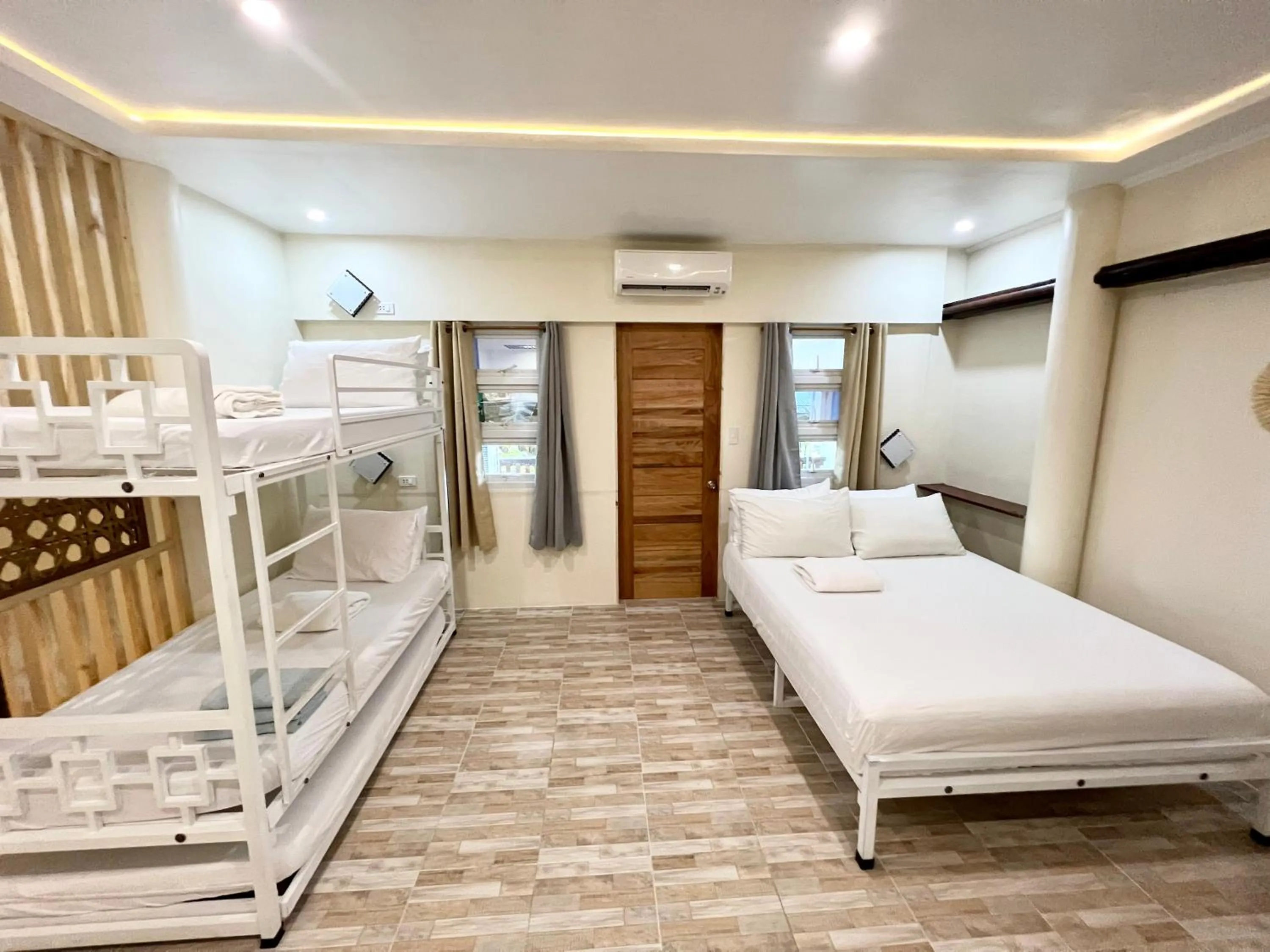 Bed in Balai Tinay Guesthouse