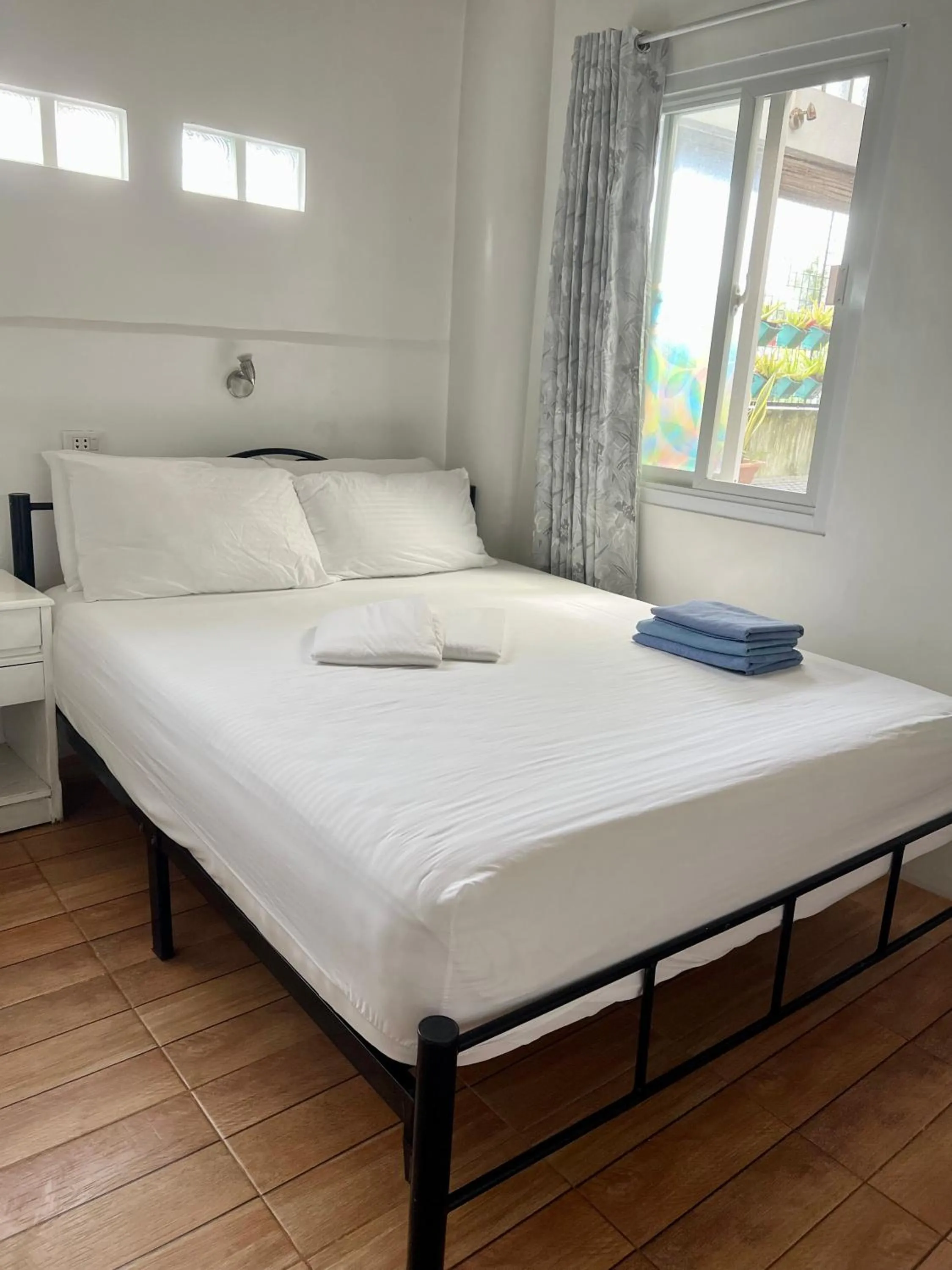 Bed in Balai Tinay Guesthouse