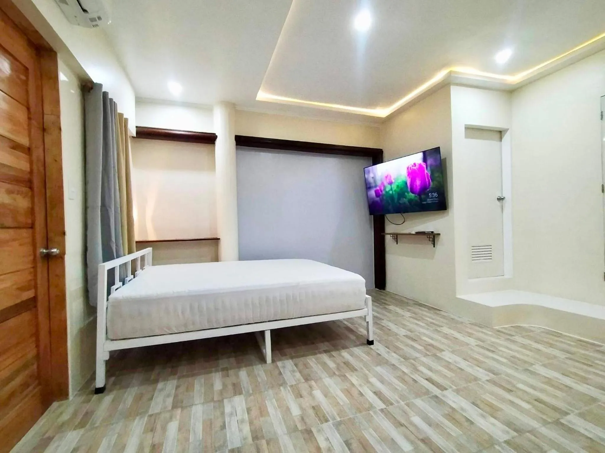 Bed in Balai Tinay Guesthouse