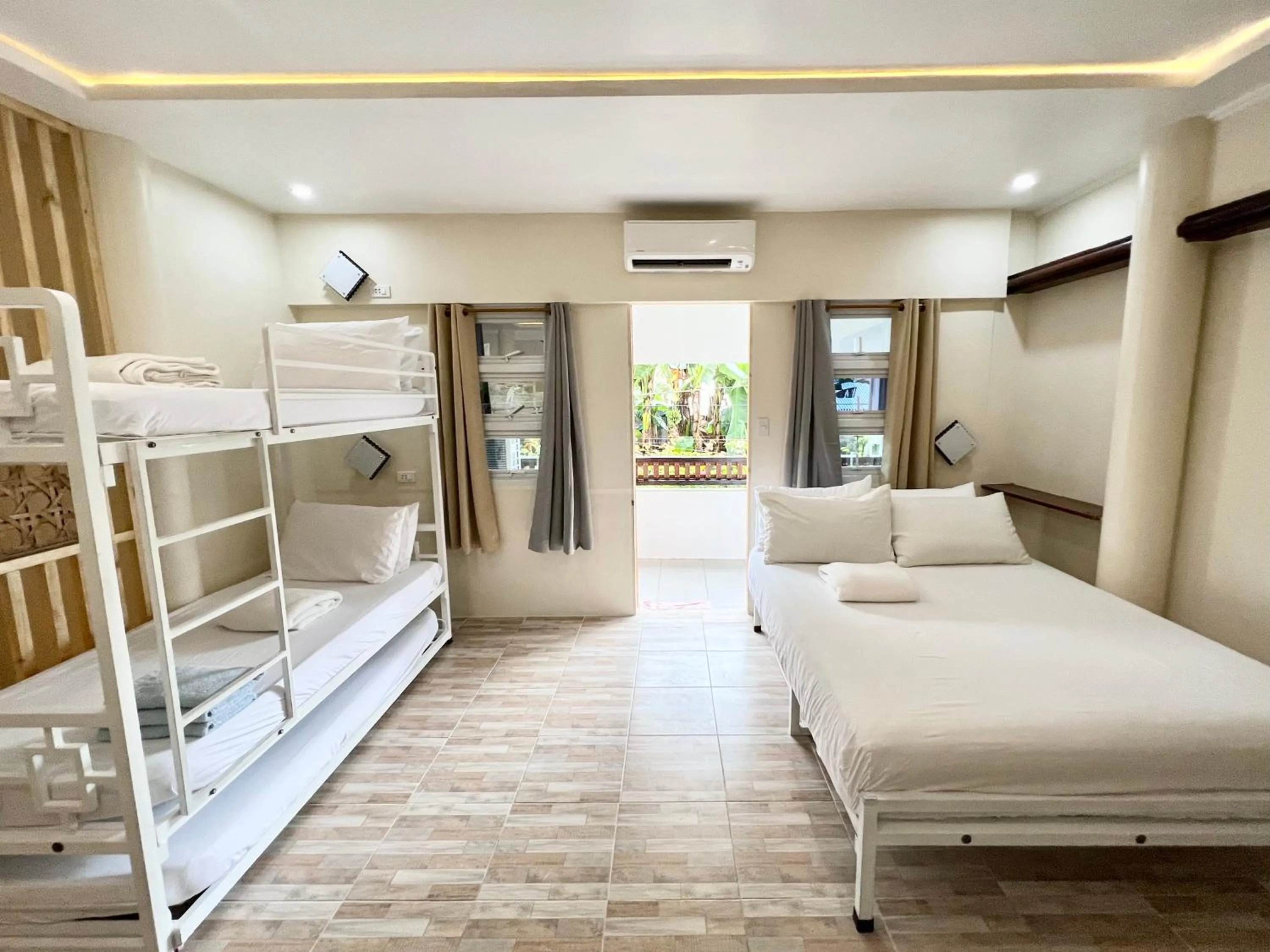 Bed in Balai Tinay Guesthouse