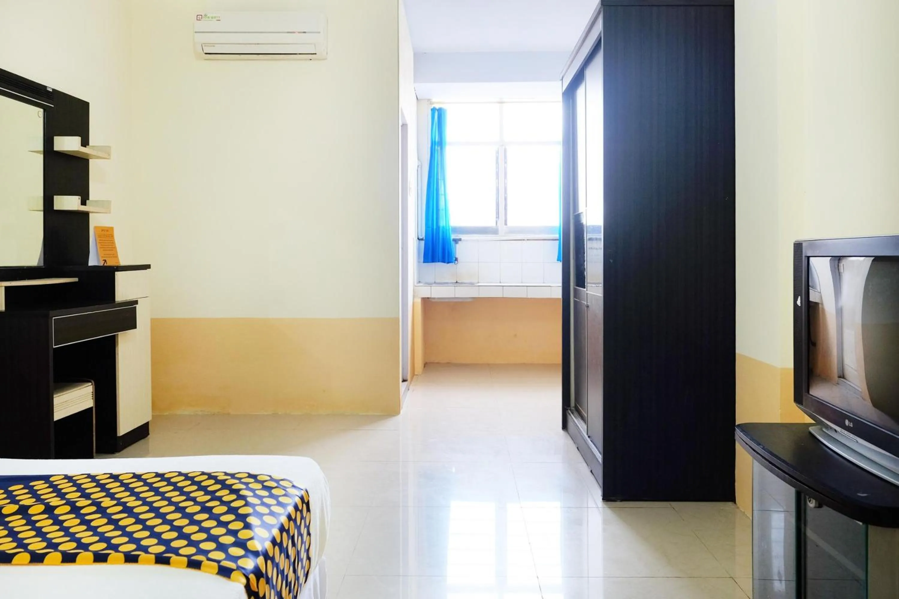 Bedroom in Hotel O Zn Guest House