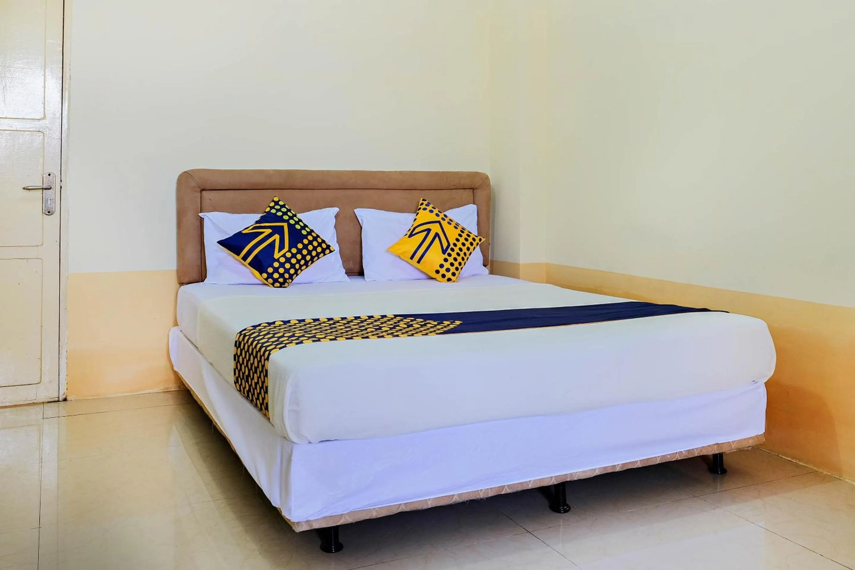 Bedroom in Hotel O Zn Guest House