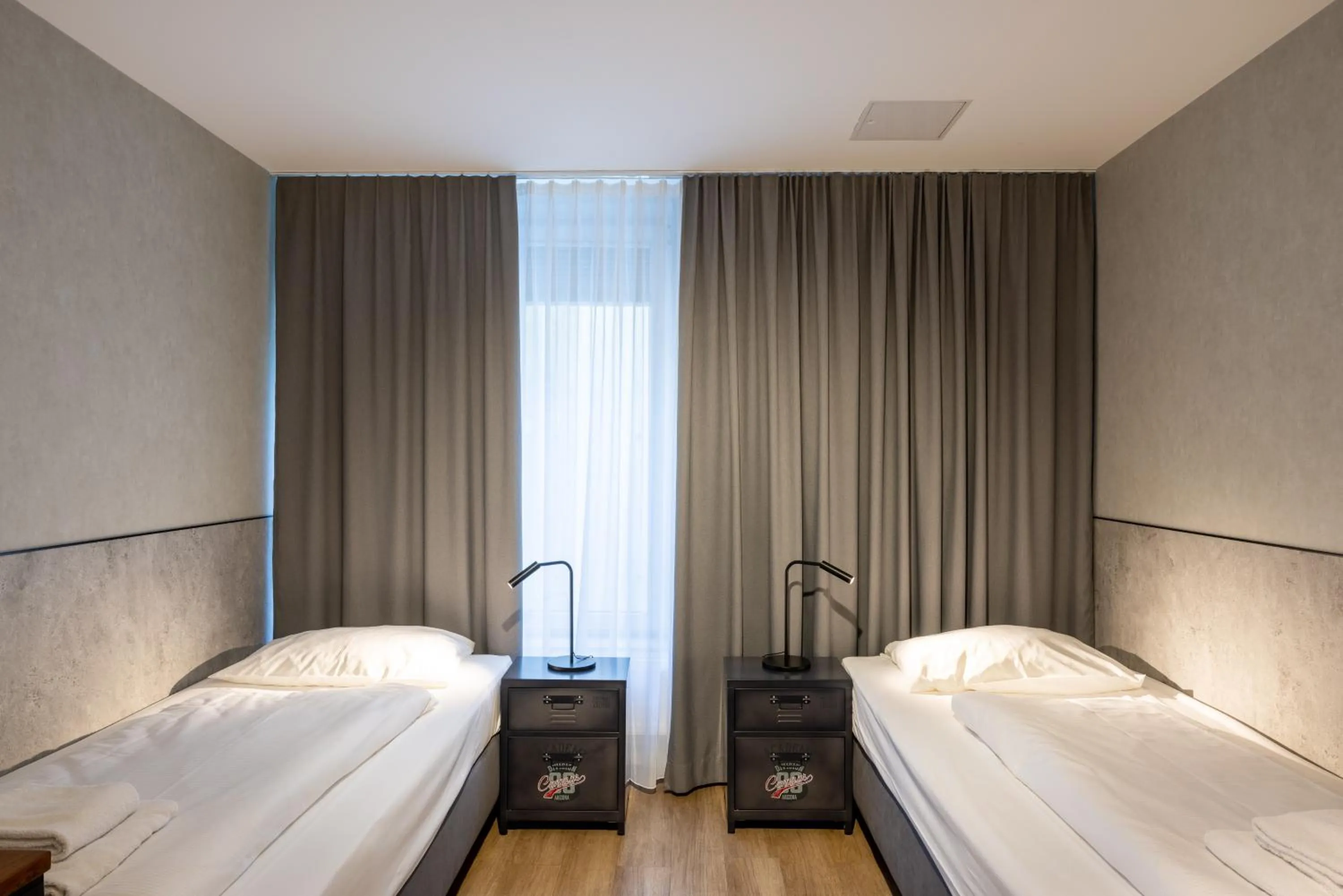 Photo of the whole room, Bed in mk hotel stuttgart